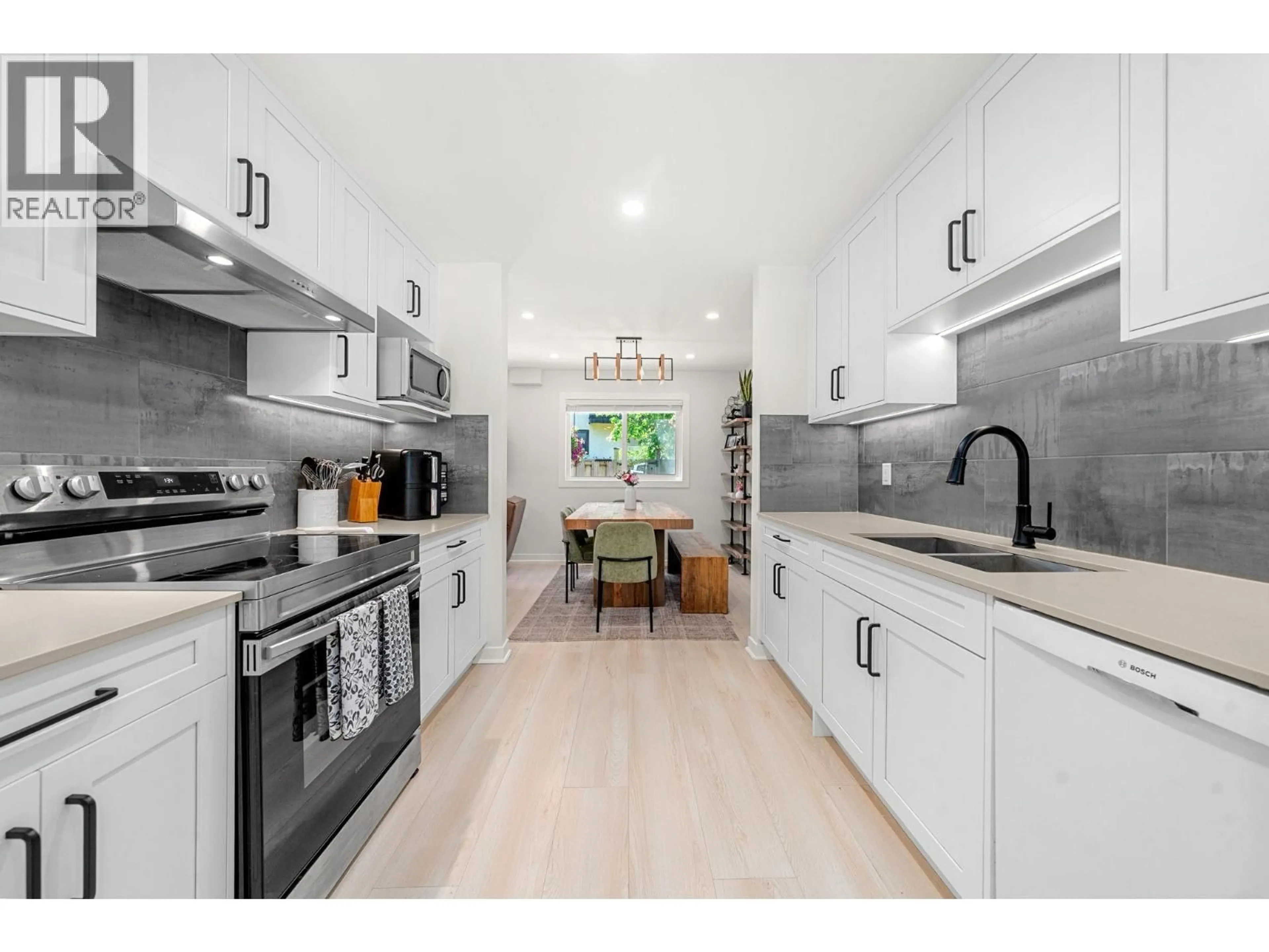 Open concept kitchen, ceramic/tile floor for 1206 PREMIER STREET, North Vancouver British Columbia V7J2H4