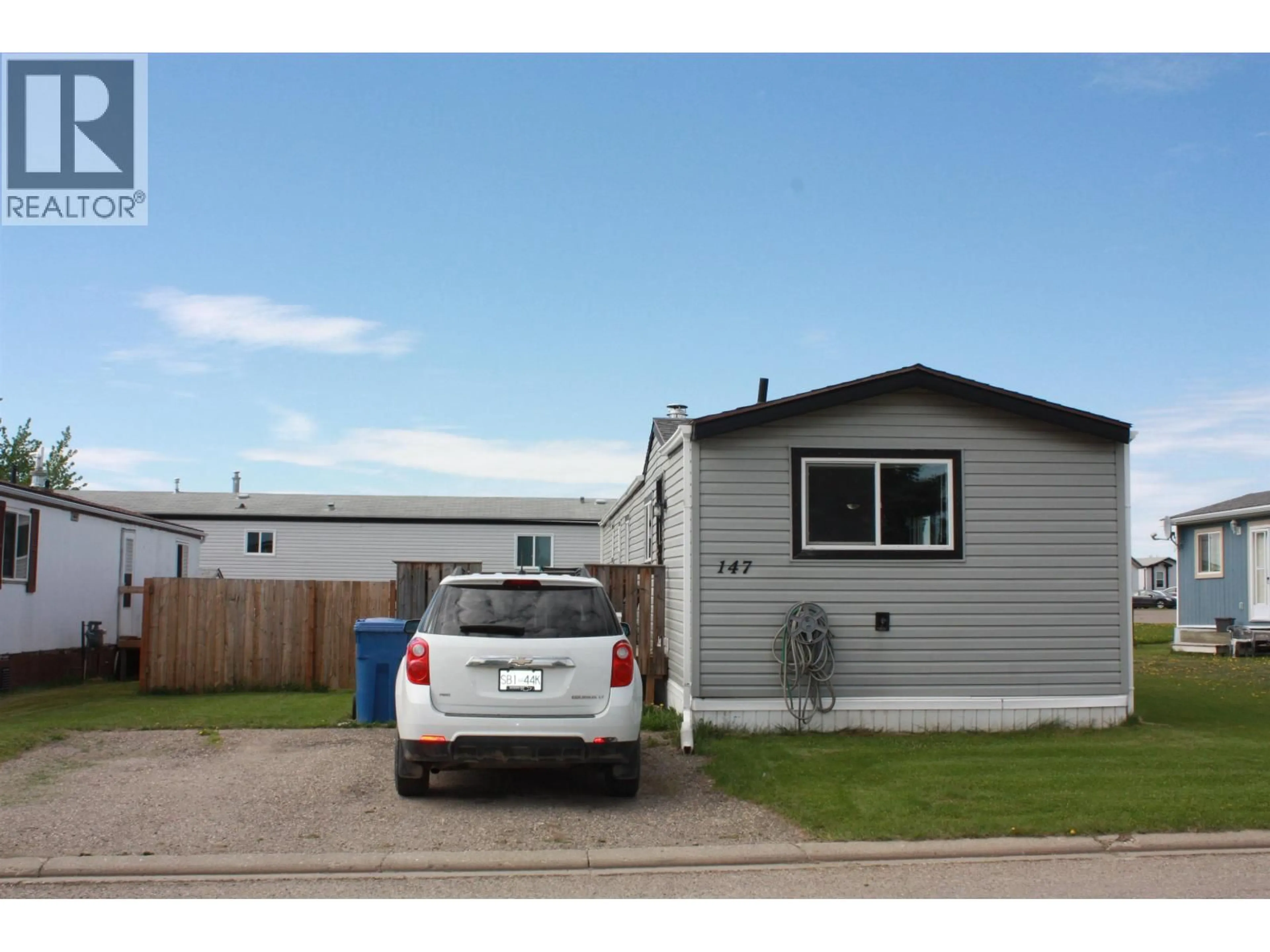 Home with vinyl exterior material, street for 147 - 9207 82 STREET, Fort St. John British Columbia V1J5G5