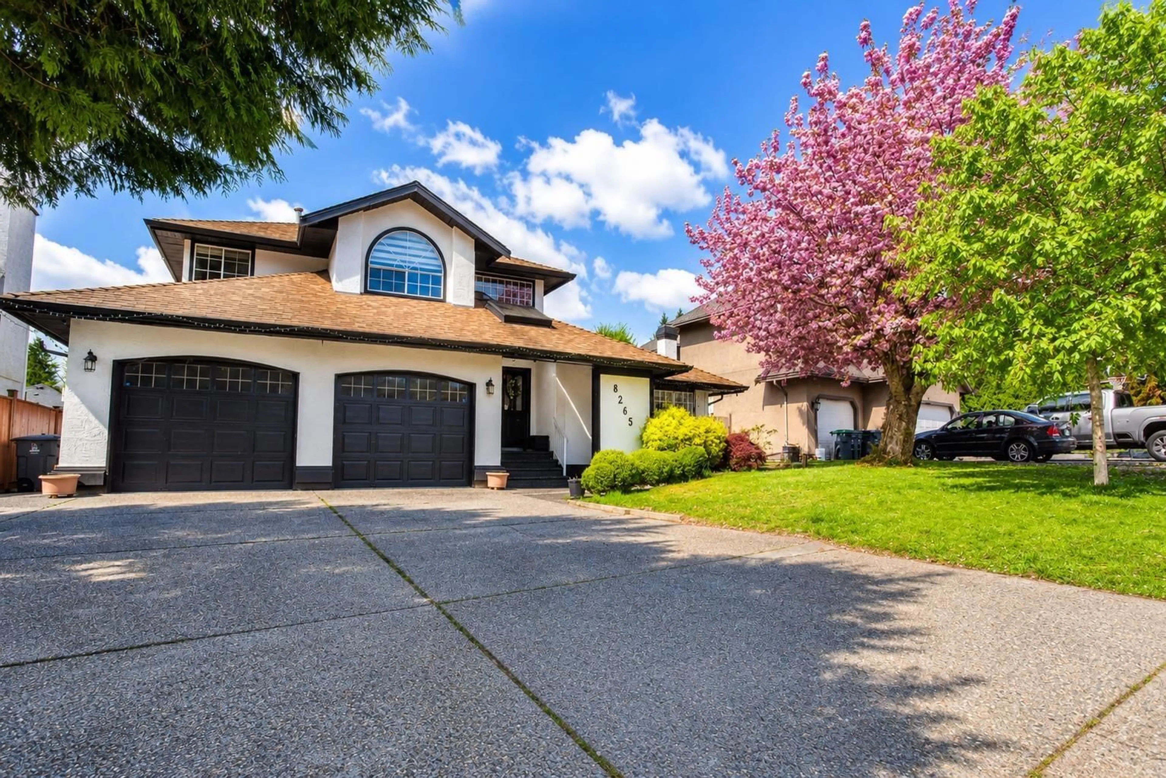 Home with vinyl exterior material, street for 8265 148B STREET, Surrey British Columbia V3S7R9