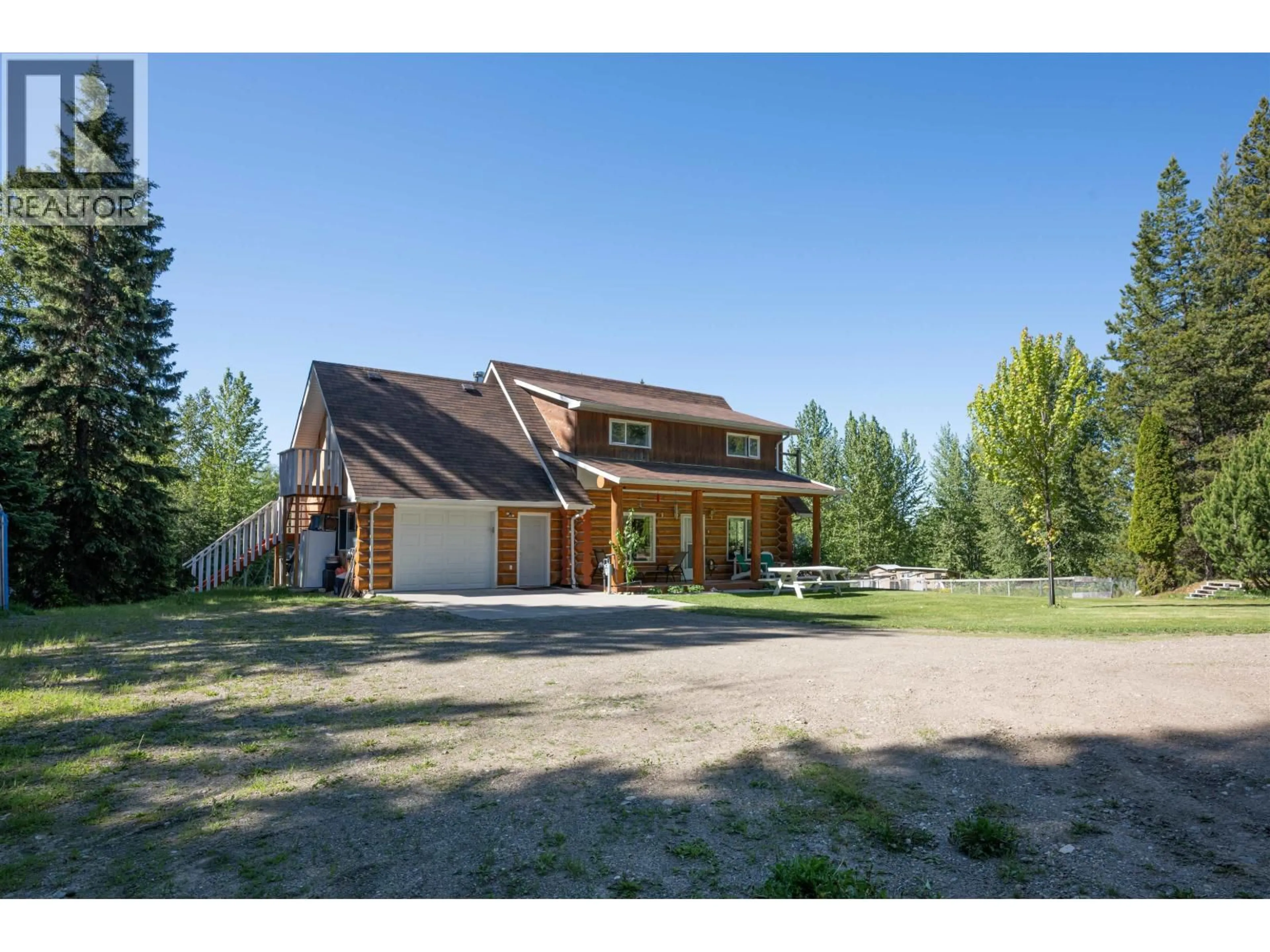 A pic from outside/outdoor area/front of a property/back of a property/a pic from drone, mountain view for 5855 DAVE ROAD, Prince George British Columbia V2N6H3