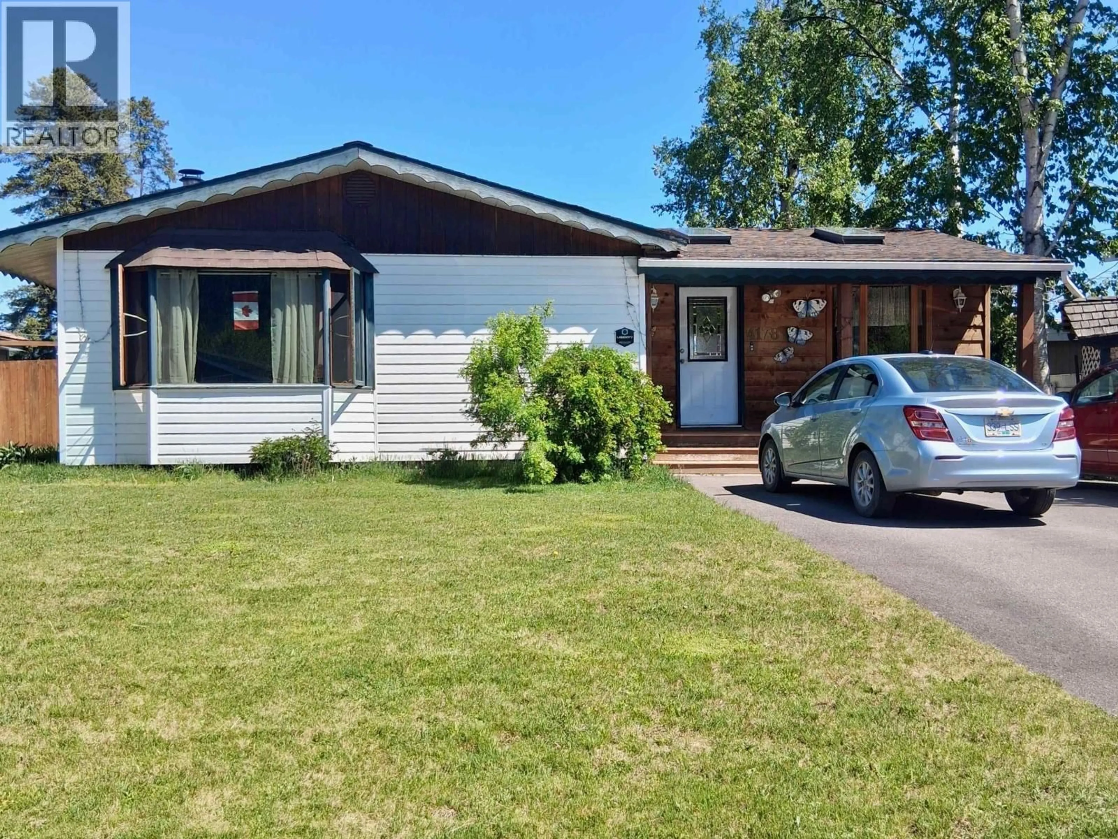Home with vinyl exterior material, street for 4178 BROADWAY AVENUE, Smithers British Columbia V0J2N0