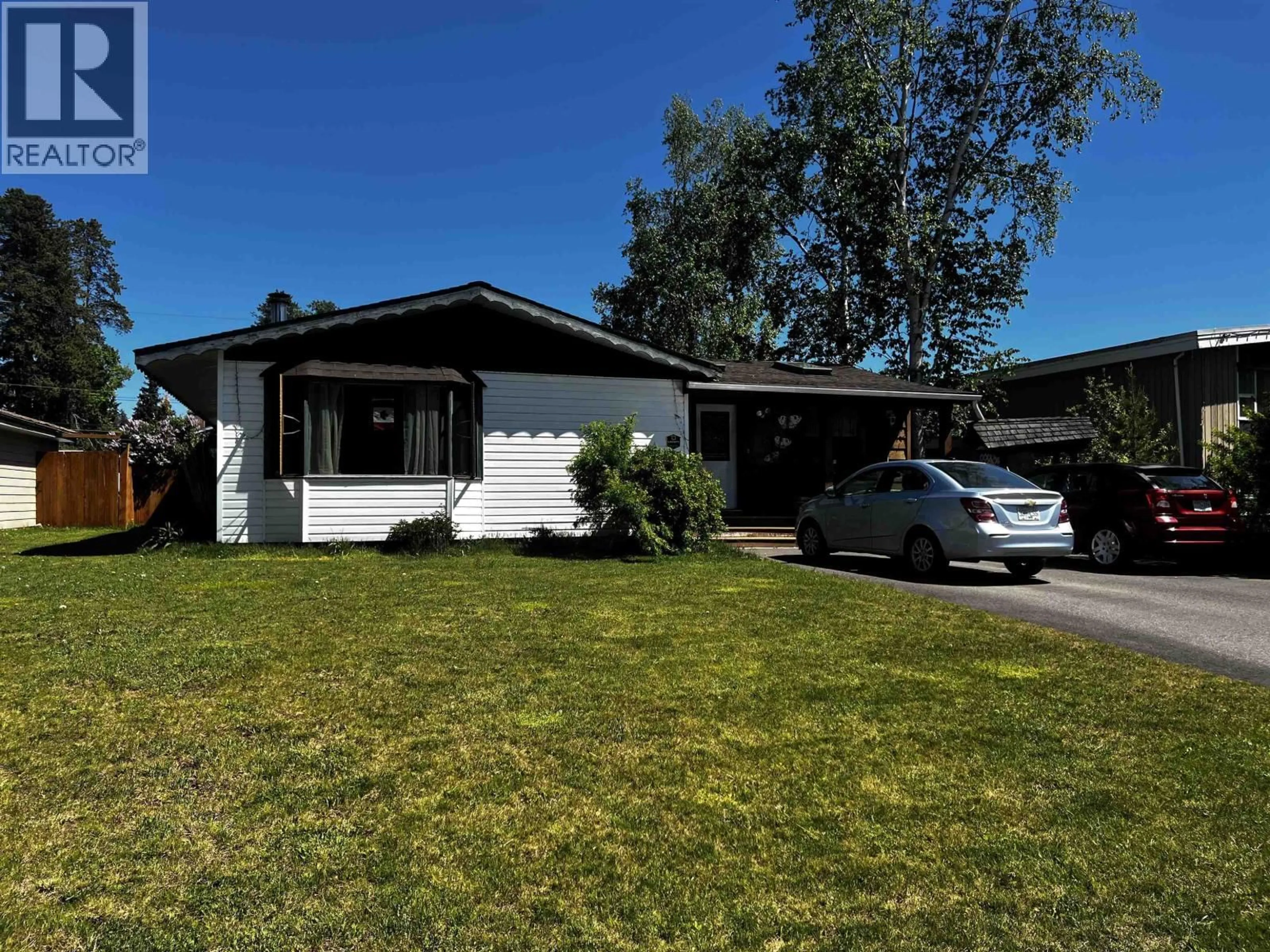 Home with vinyl exterior material, street for 4178 BROADWAY AVENUE, Smithers British Columbia V0J2N0