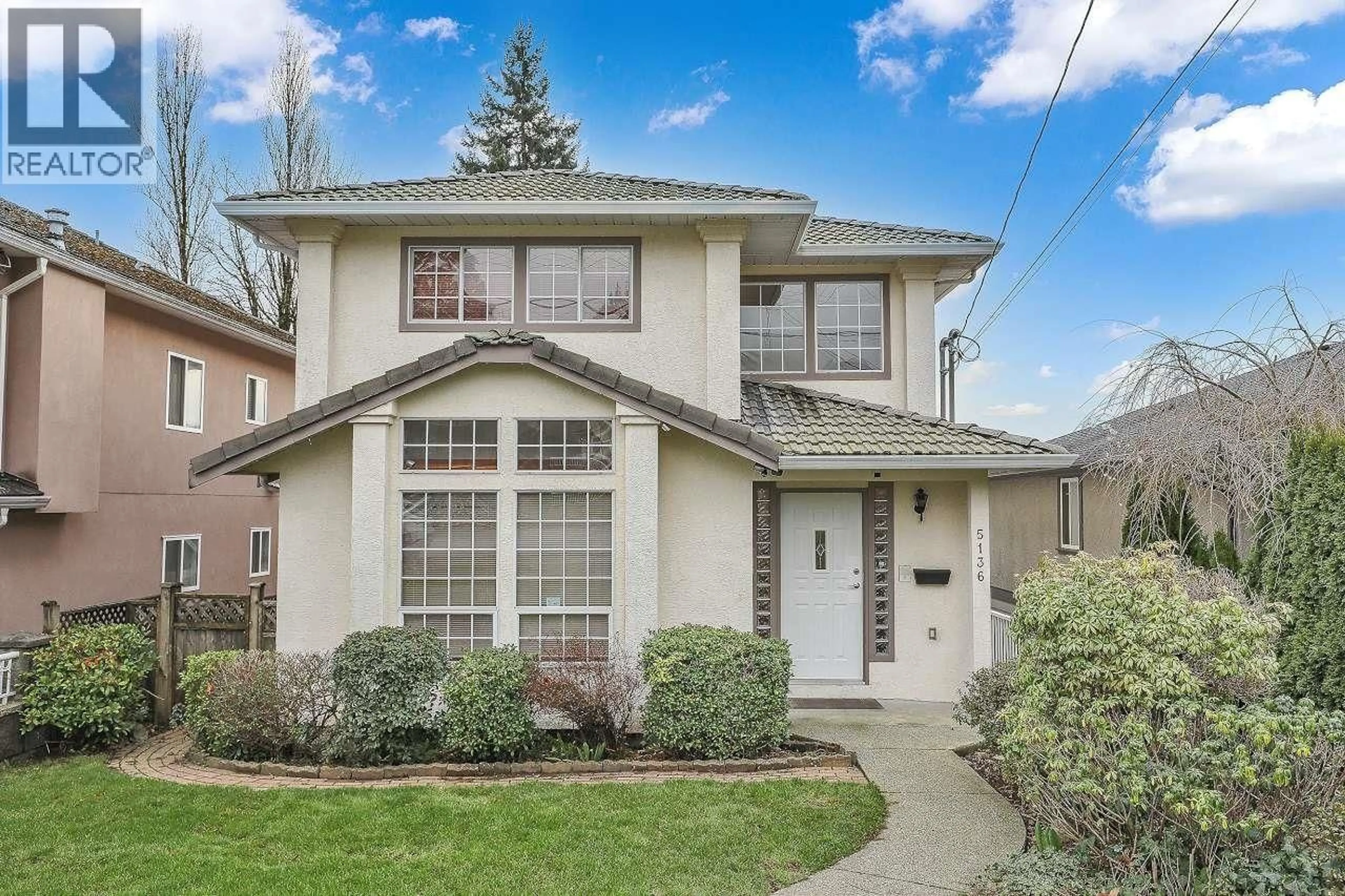 Home with vinyl exterior material, street for 5136 PORTLAND STREET, Burnaby British Columbia V5J2P9