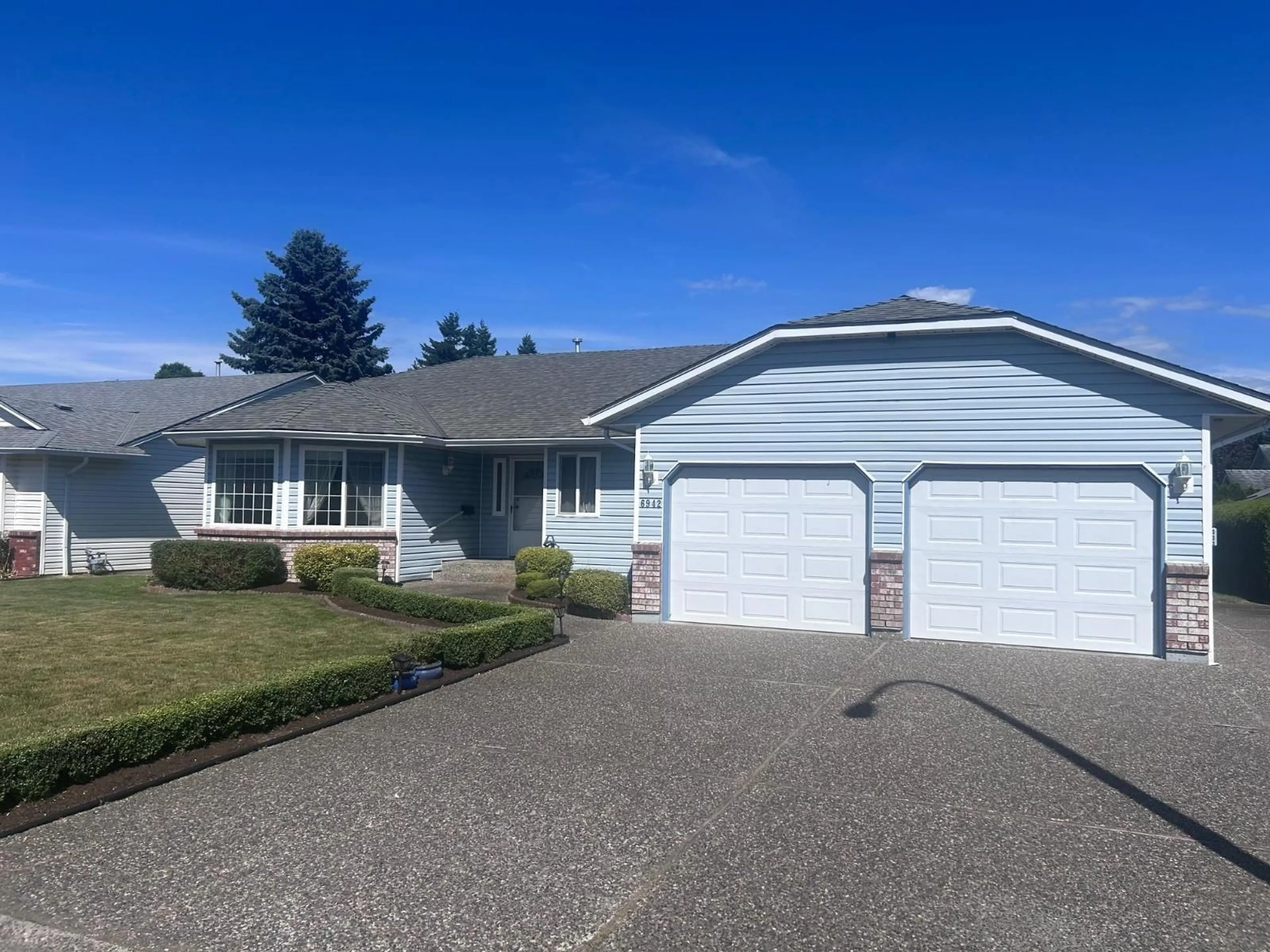 Home with vinyl exterior material, street for 6942 COACH LAMP DRIVE, Chilliwack British Columbia V2R2X6