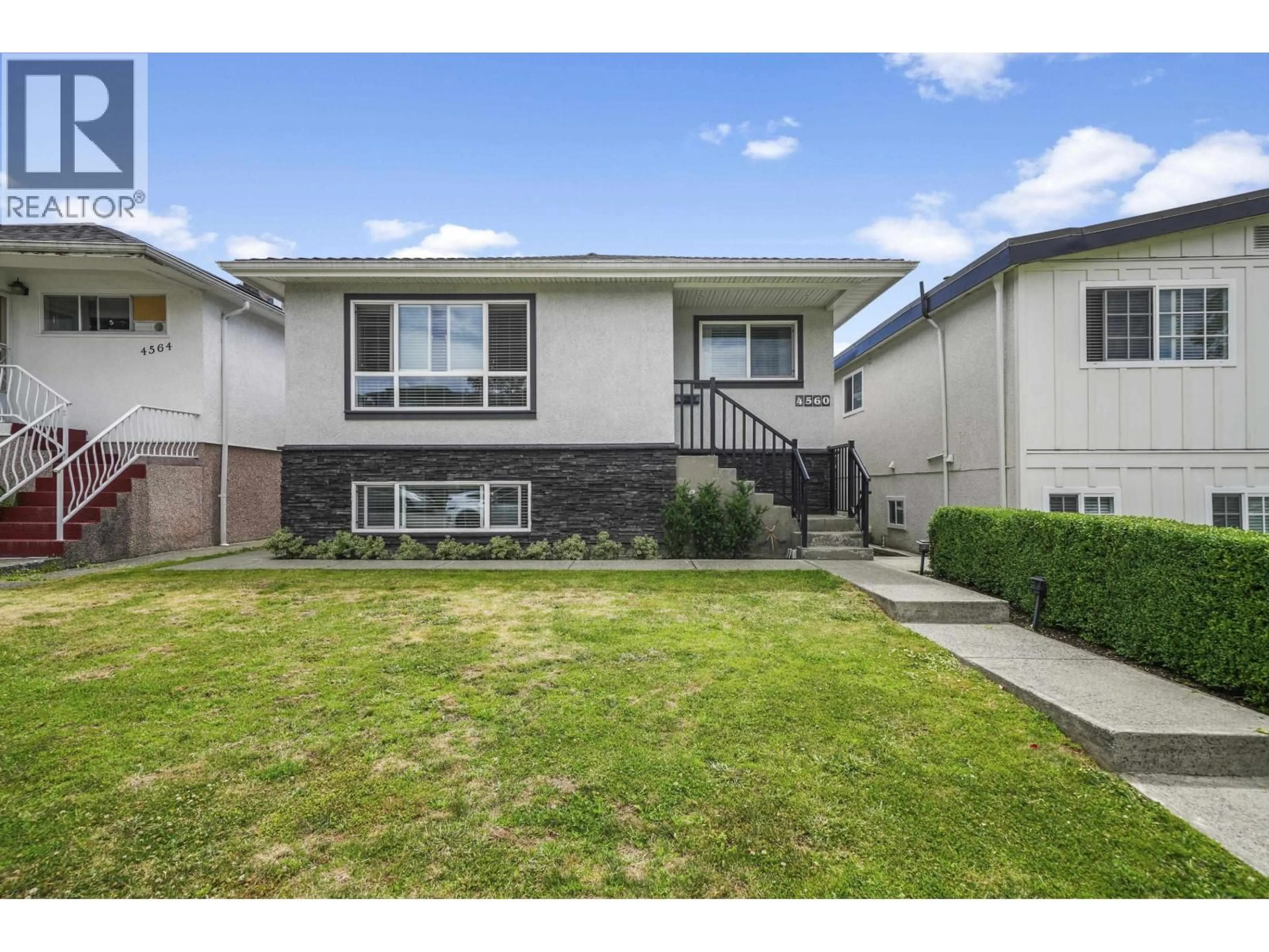 Home with vinyl exterior material, street for 4560 PENDER STREET, Burnaby British Columbia V5C2N1