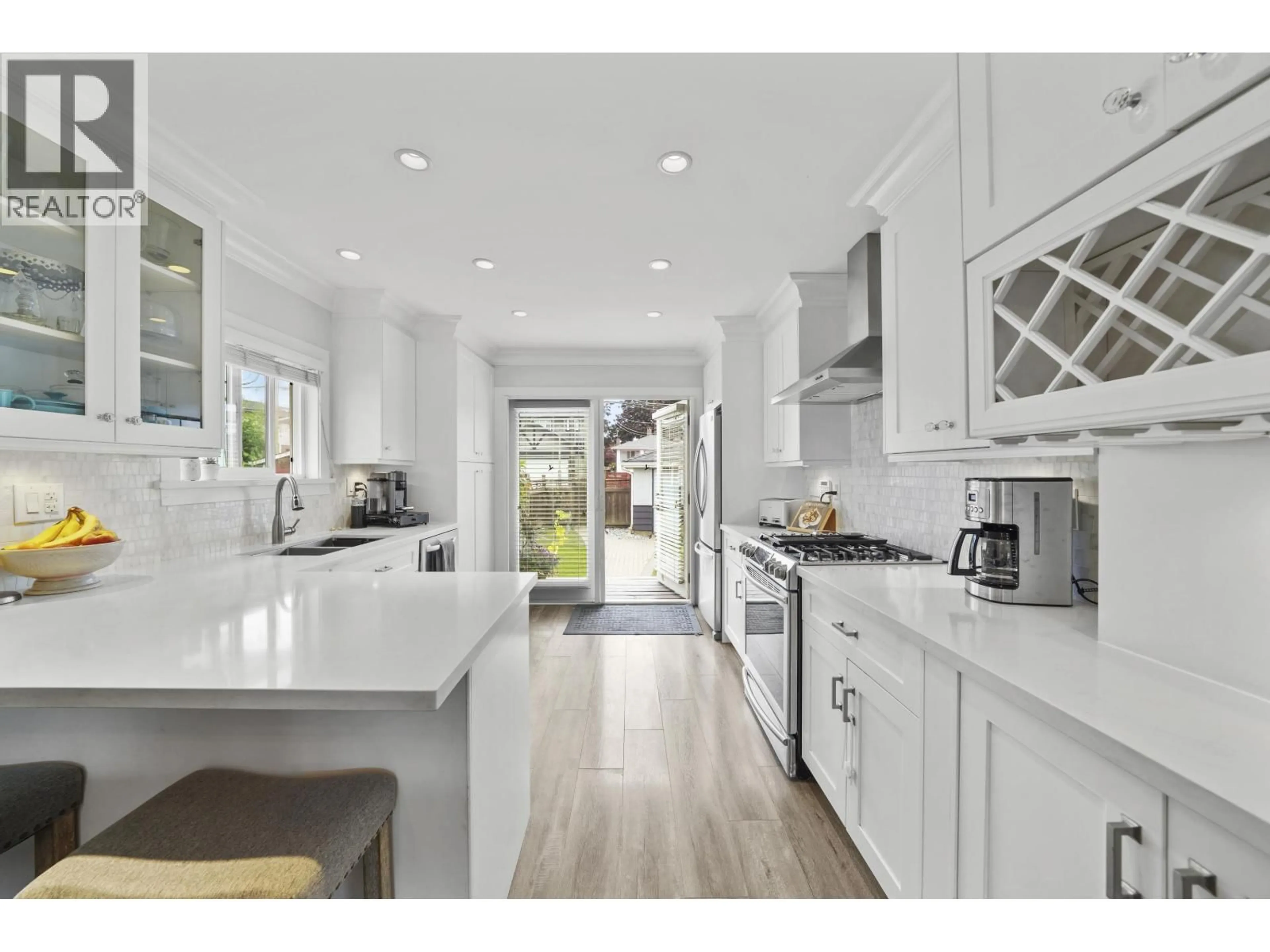Open concept kitchen, ceramic/tile floor for 4560 PENDER STREET, Burnaby British Columbia V5C2N1