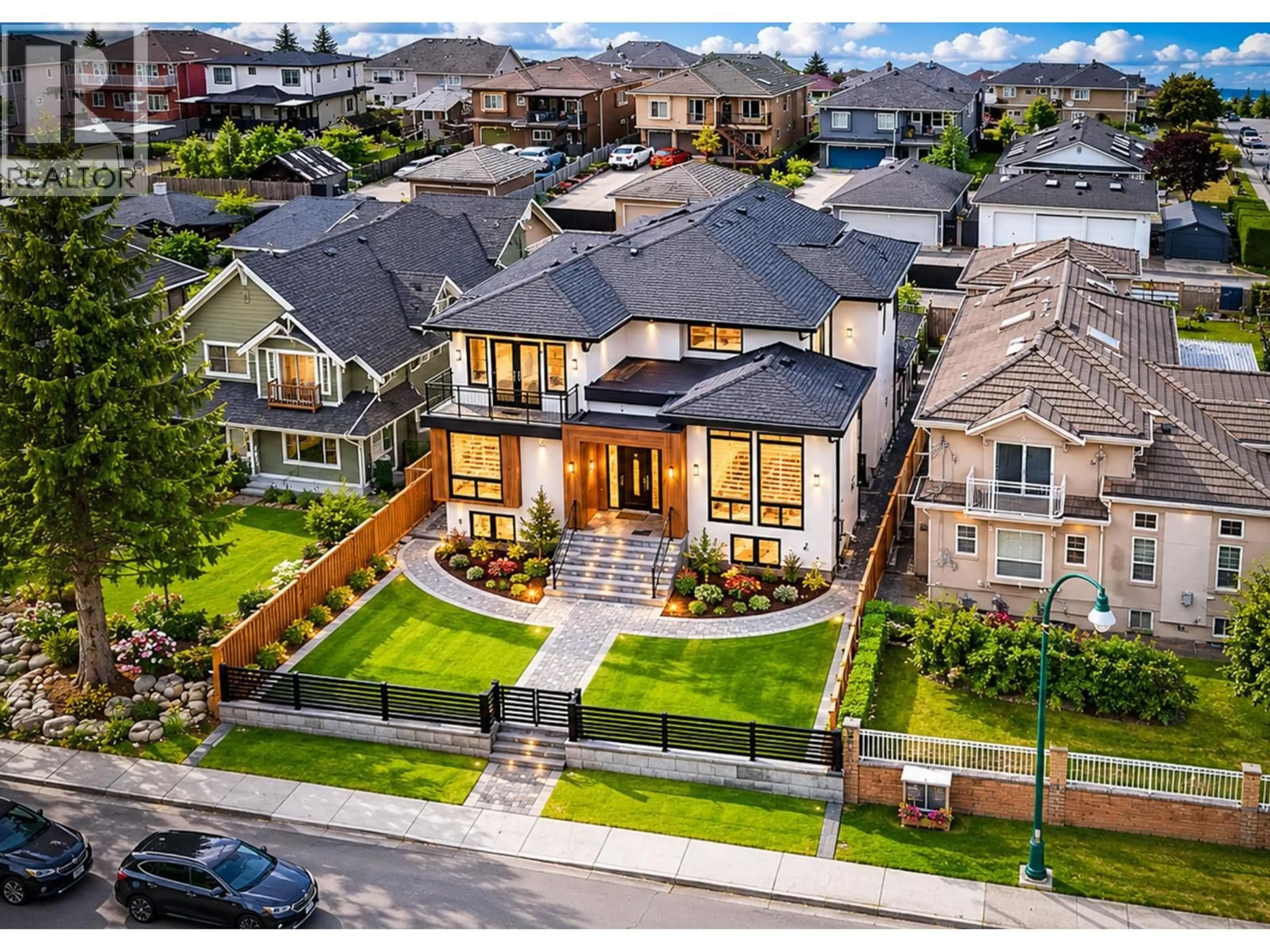 A pic from outside/outdoor area/front of a property/back of a property/a pic from drone, street for 8093 14TH AVENUE, Burnaby British Columbia V3N2B5