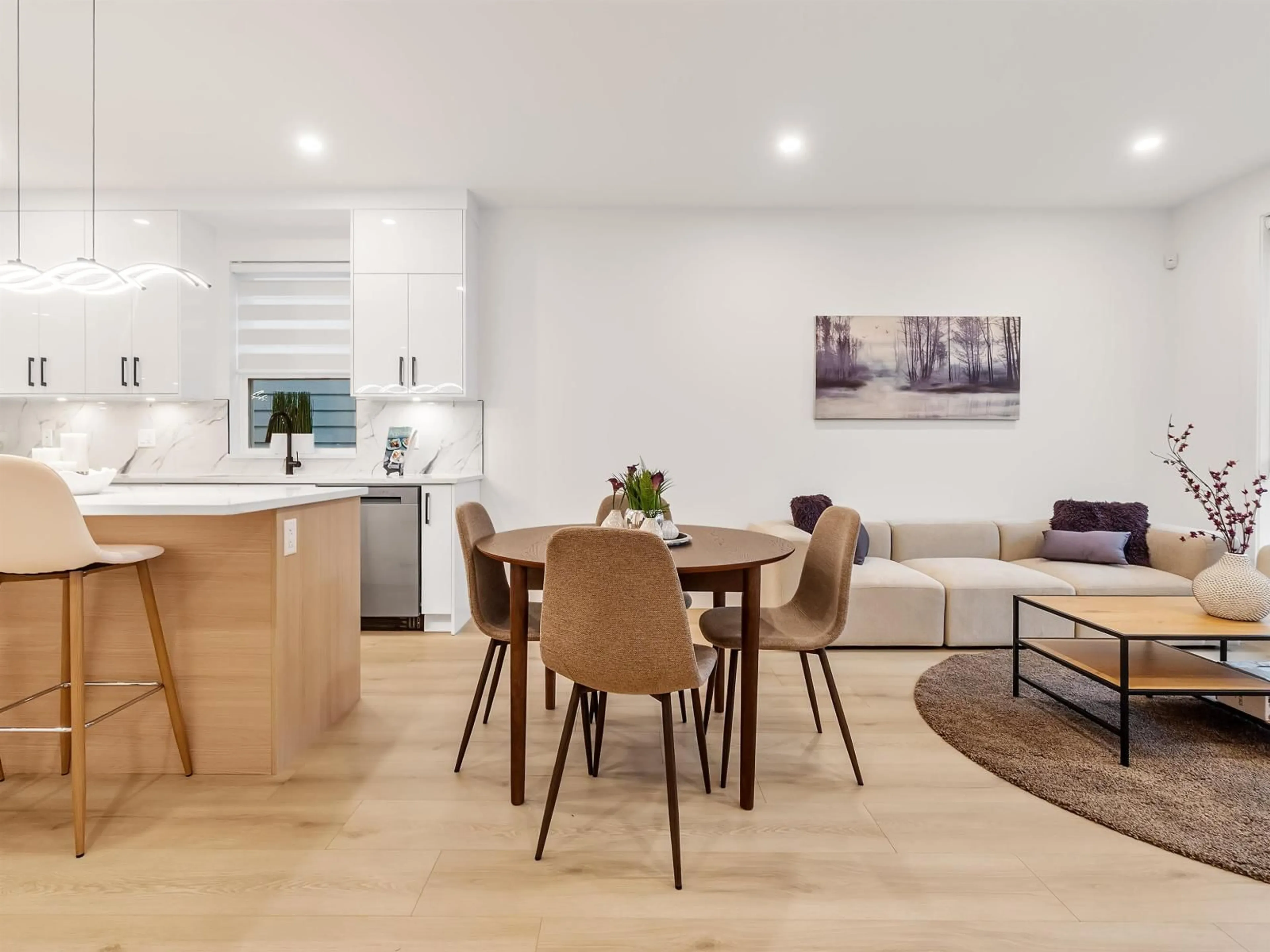 Open concept kitchen, wood/laminate floor for 102 - 16697 16 AVENUE, Surrey British Columbia V3S9X7