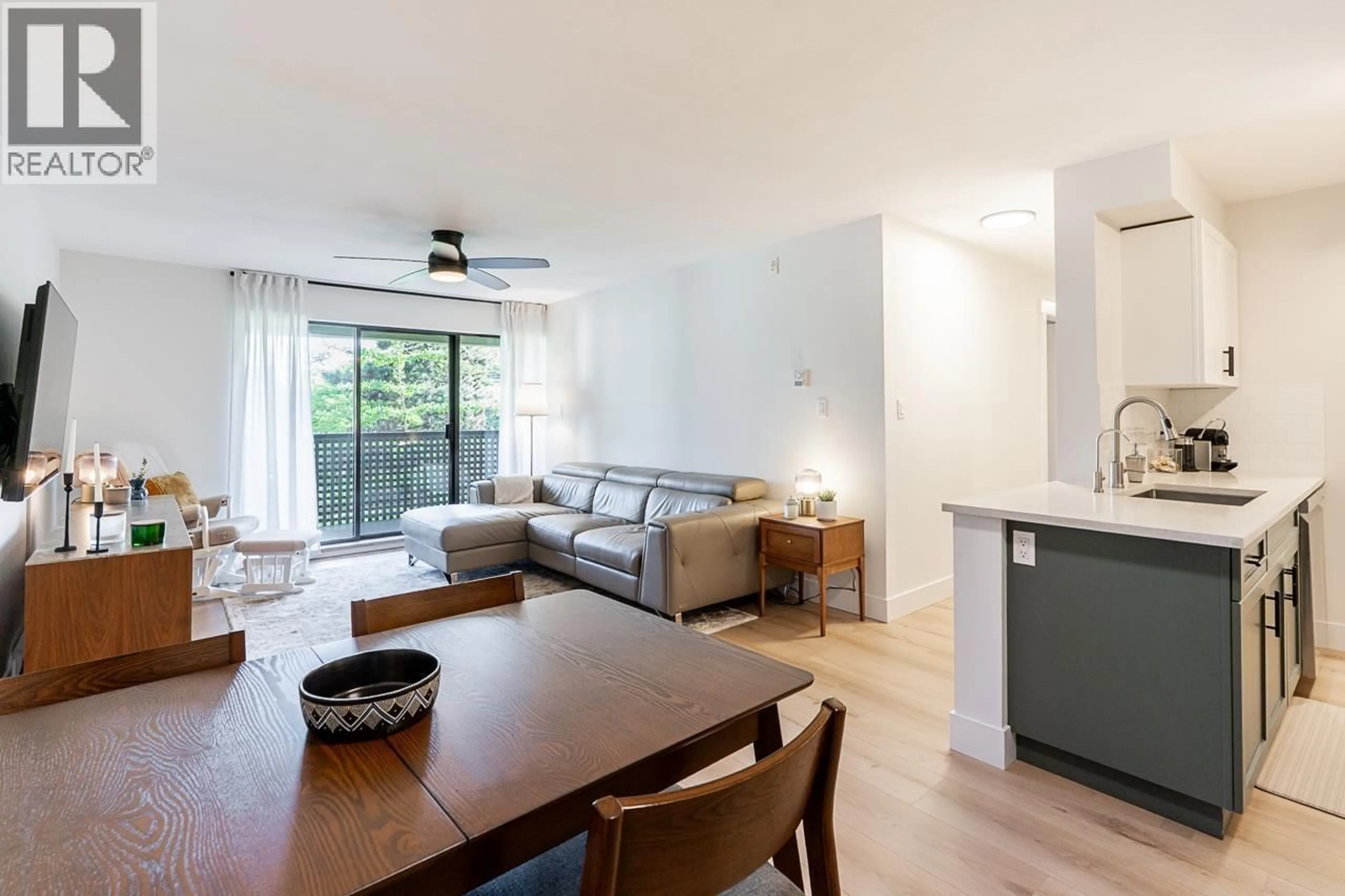 Living room with furniture, wood/laminate floor for 302 - 1200 PACIFIC STREET, Coquitlam British Columbia V3B6E5