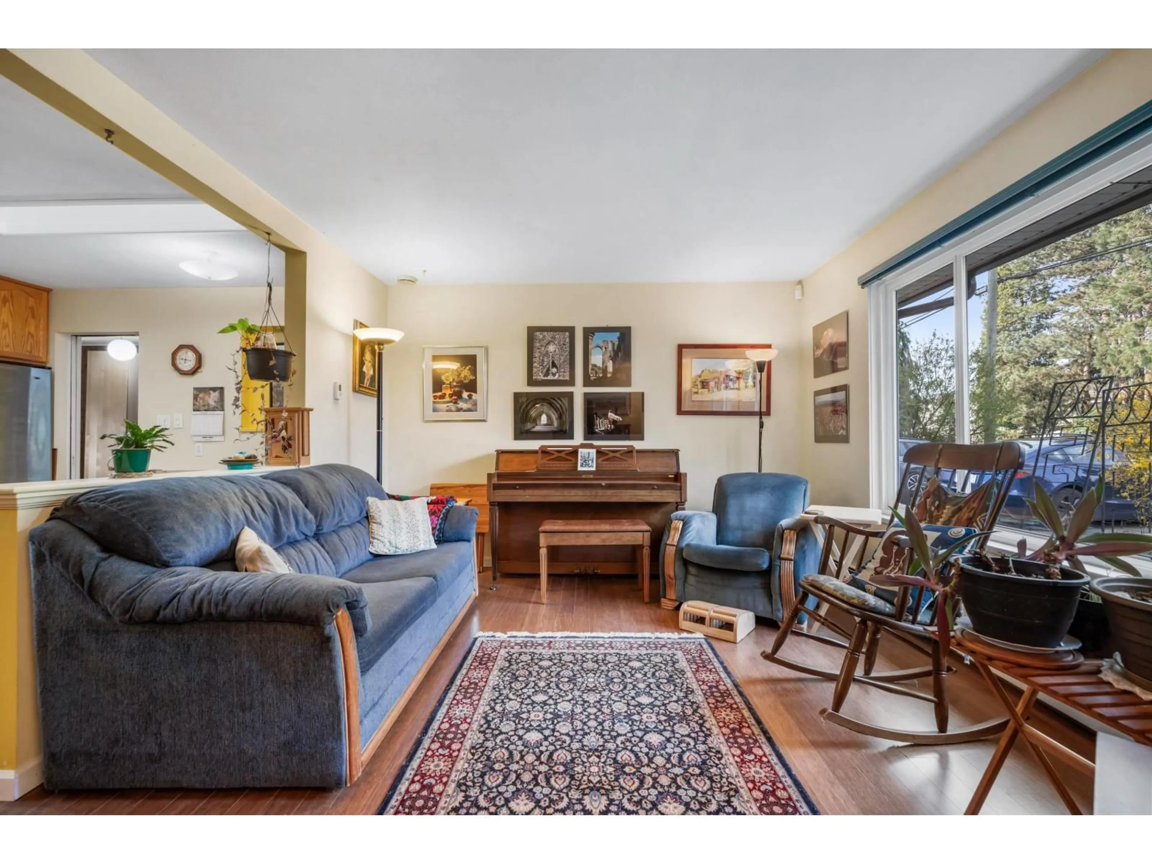 Living room with furniture, wood/laminate floor for 8952 WRIGHT STREET, Langley British Columbia V1M3T2