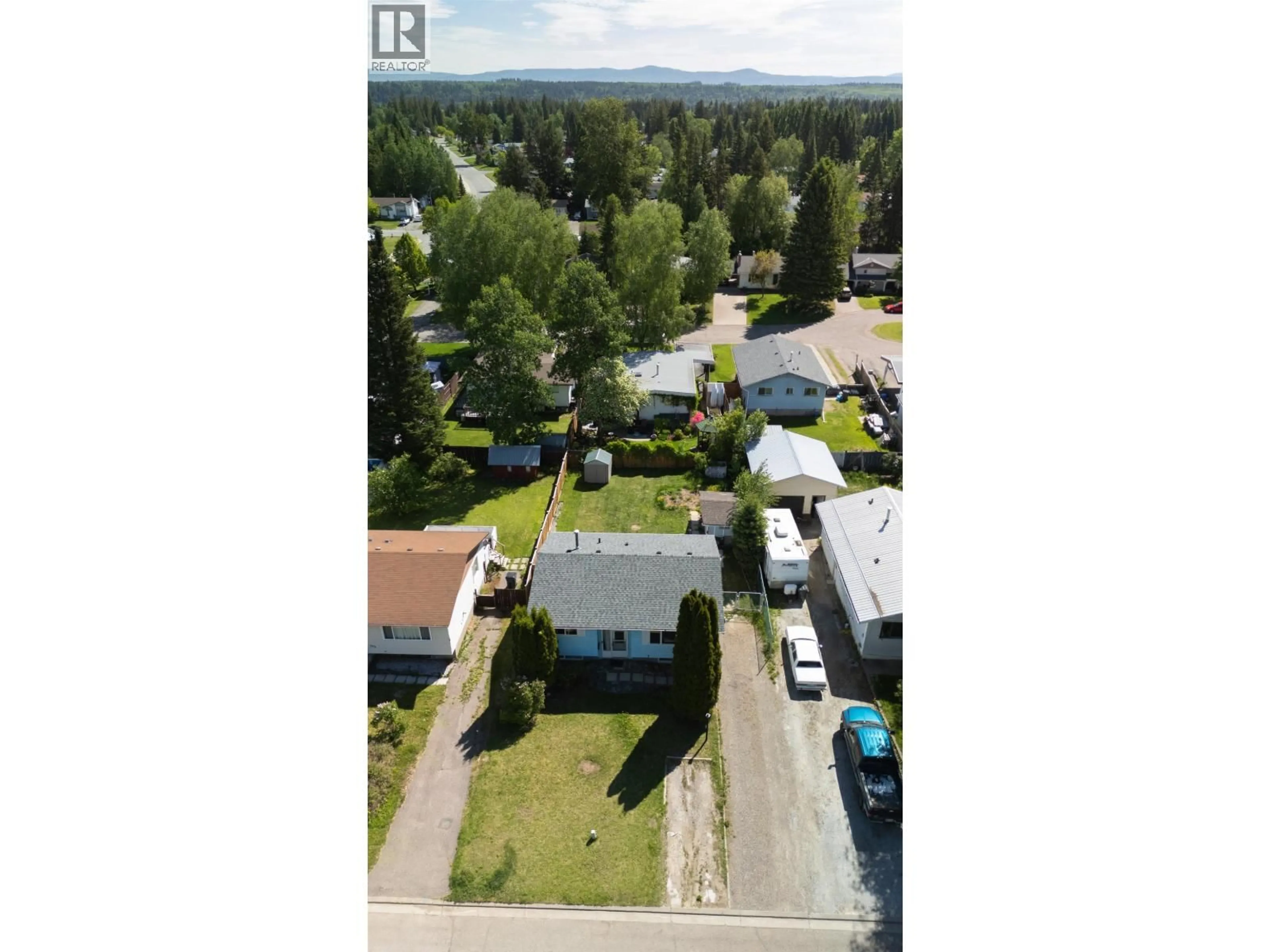 A pic from outside/outdoor area/front of a property/back of a property/a pic from drone, street for 7890 PIEDMONT CRESCENT, Prince George British Columbia V2N3H9