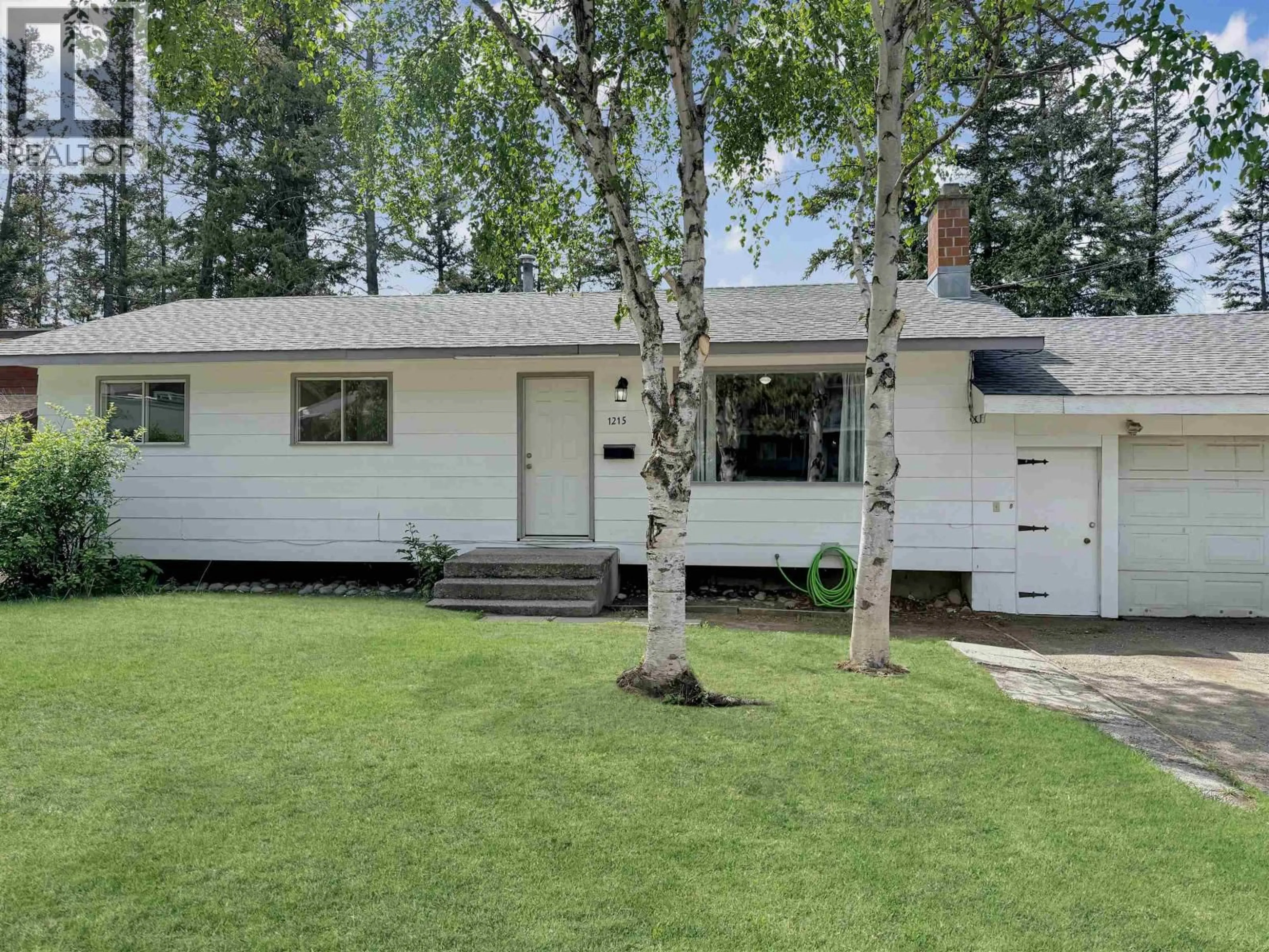 Home with vinyl exterior material, street for 1215 12TH AVENUE, Williams Lake British Columbia V2G2N9