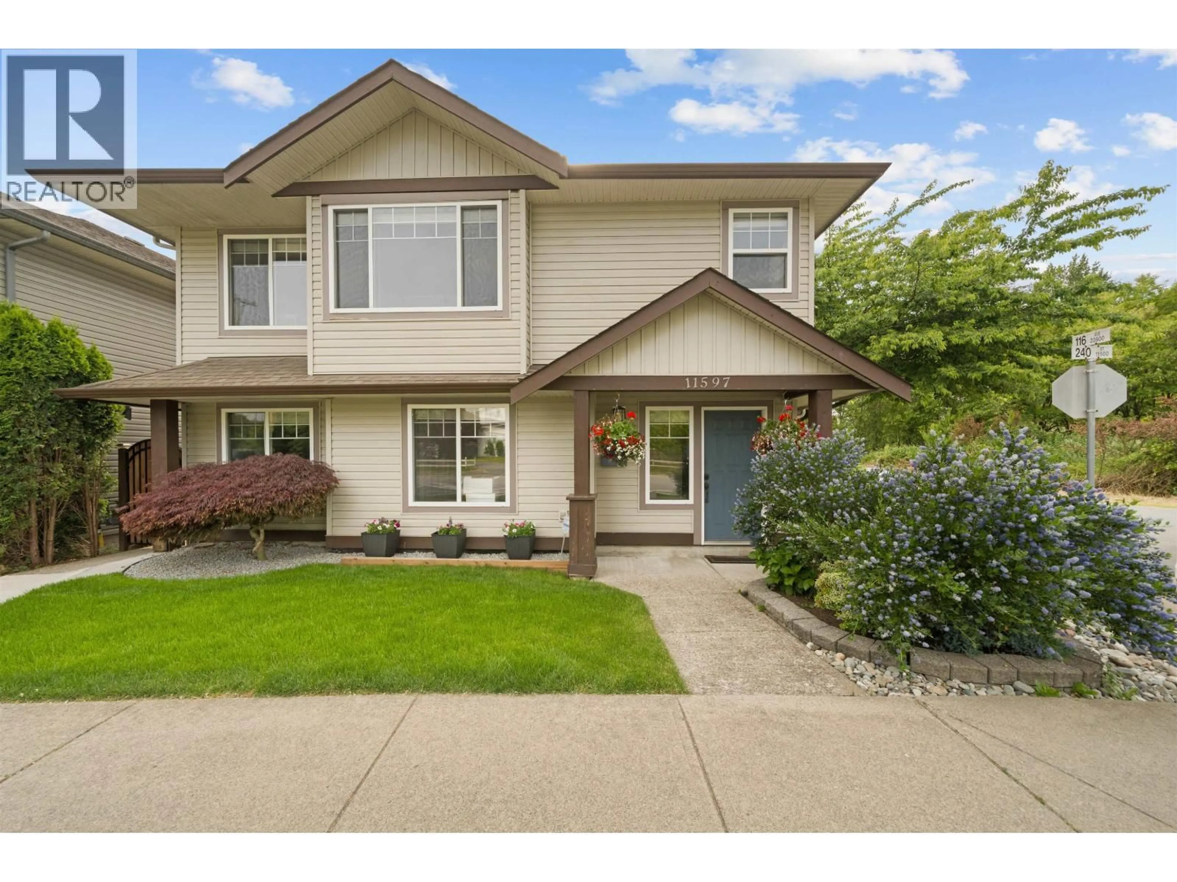 Home with vinyl exterior material, street for 11597 240 STREET, Maple Ridge British Columbia V2W1A3