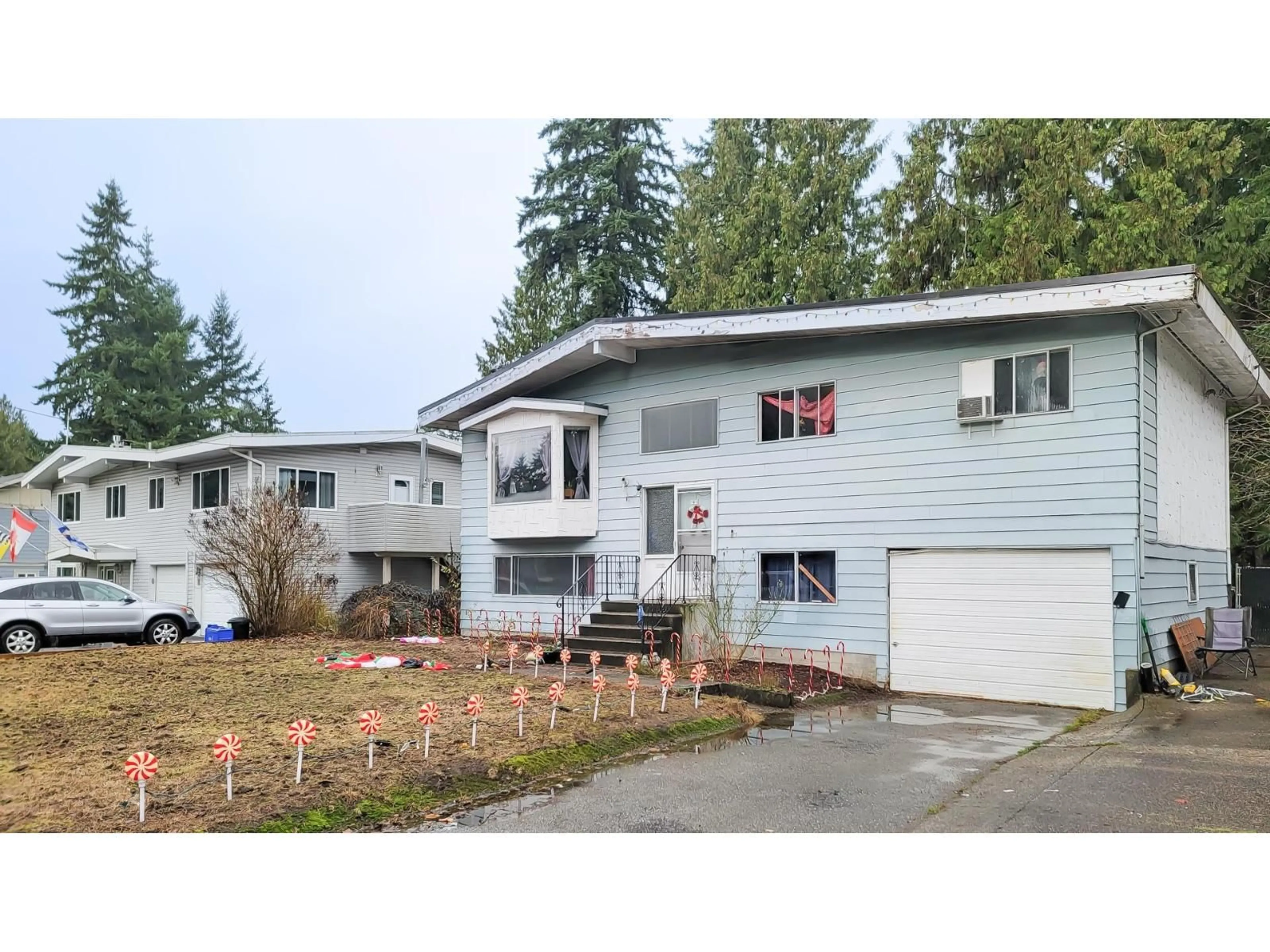 Home with vinyl exterior material, street for 20567 42 AVENUE, Langley British Columbia V3A3A8