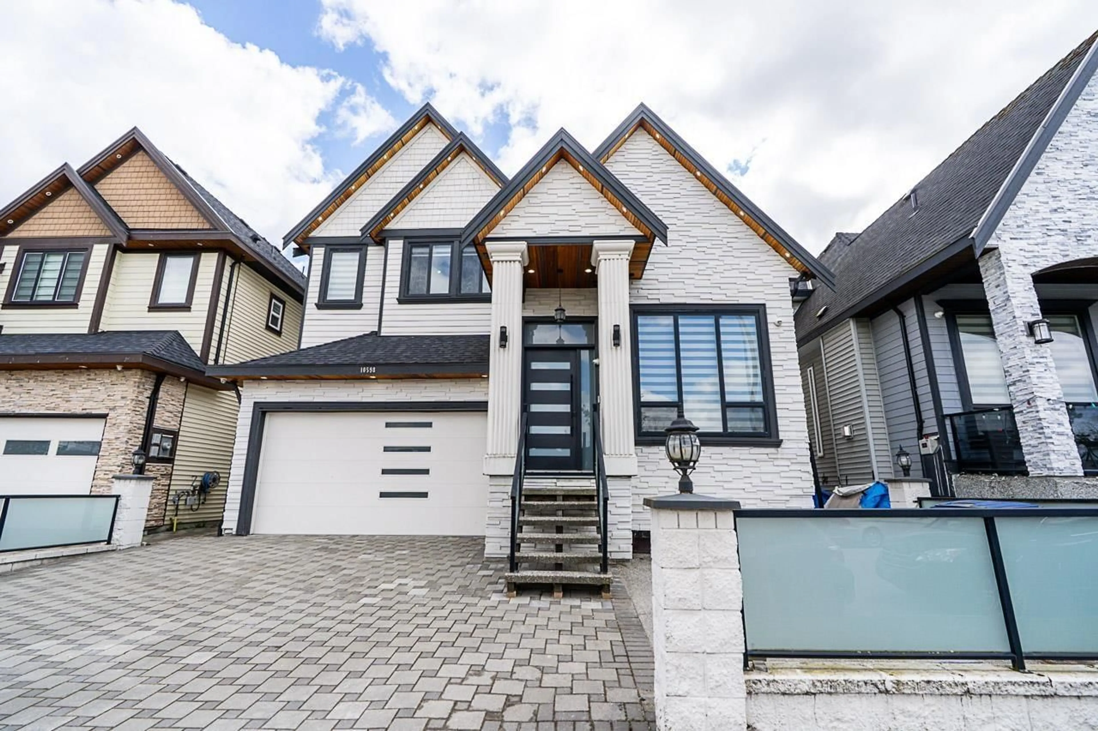 Home with brick exterior material, street for 10598 124 STREET, Surrey British Columbia V3V0E2