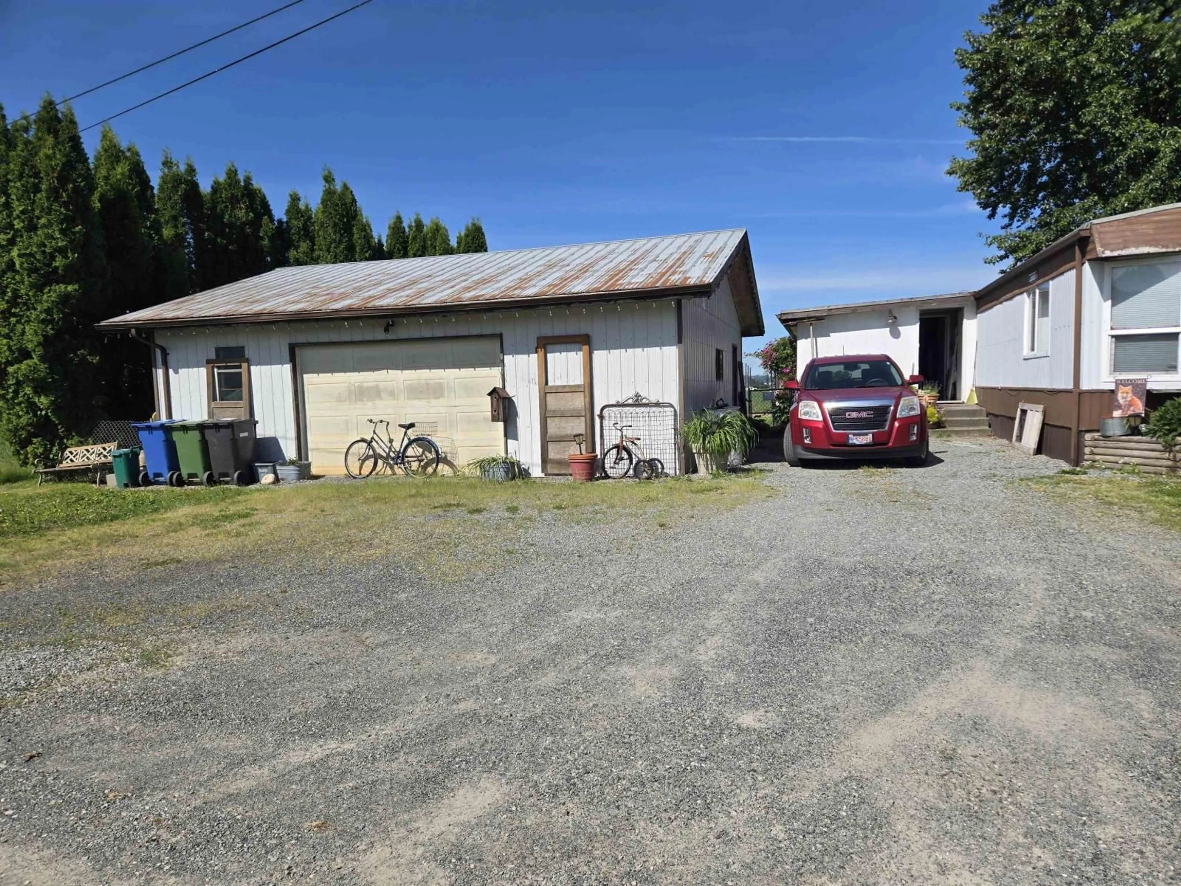 A pic from outside/outdoor area/front of a property/back of a property/a pic from drone, street for 34561 FORE ROAD, Abbotsford British Columbia V3G1R6