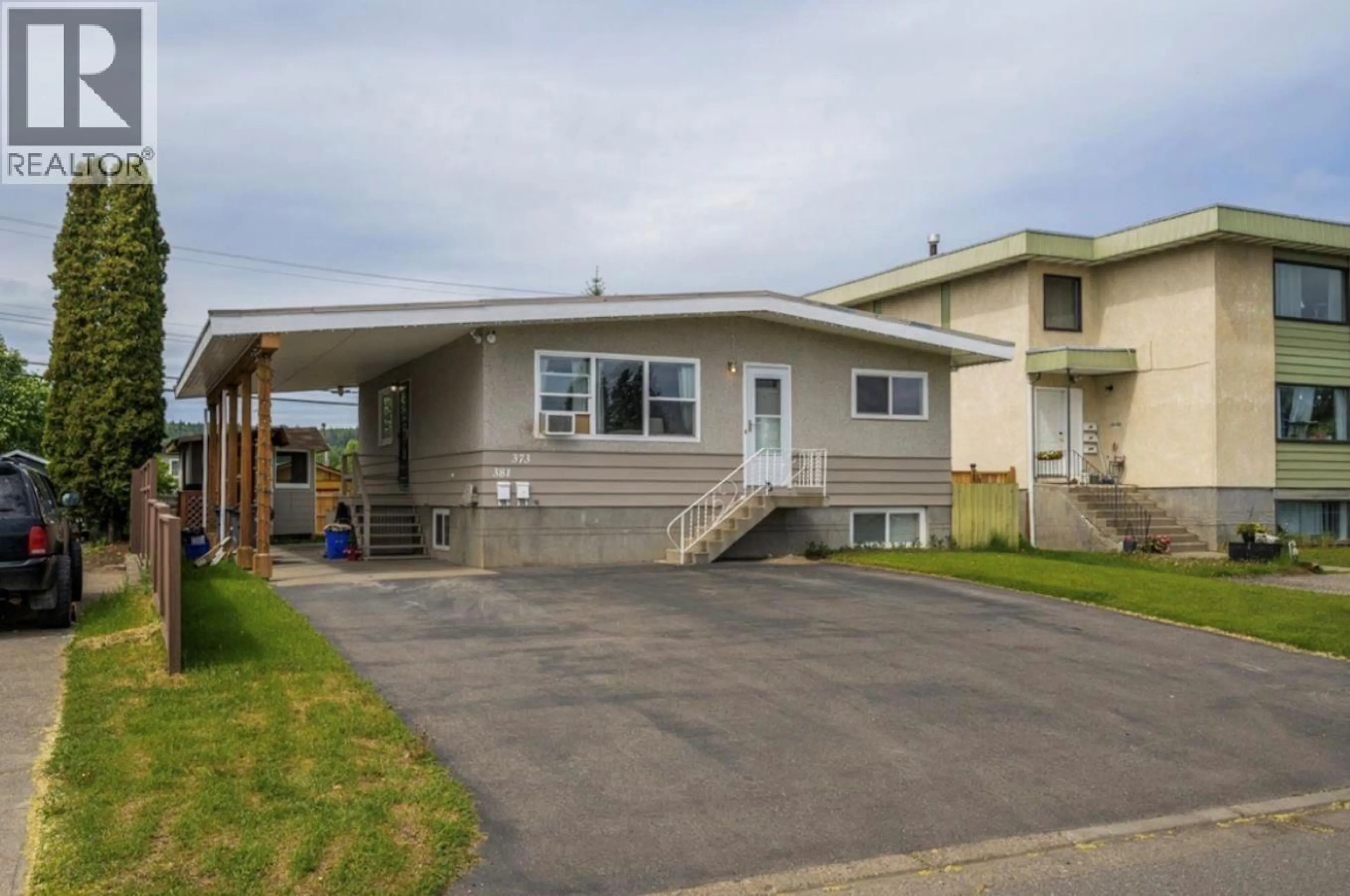 Home with vinyl exterior material, street for 373 NICHOLSON STREET, Prince George British Columbia V2M3L8