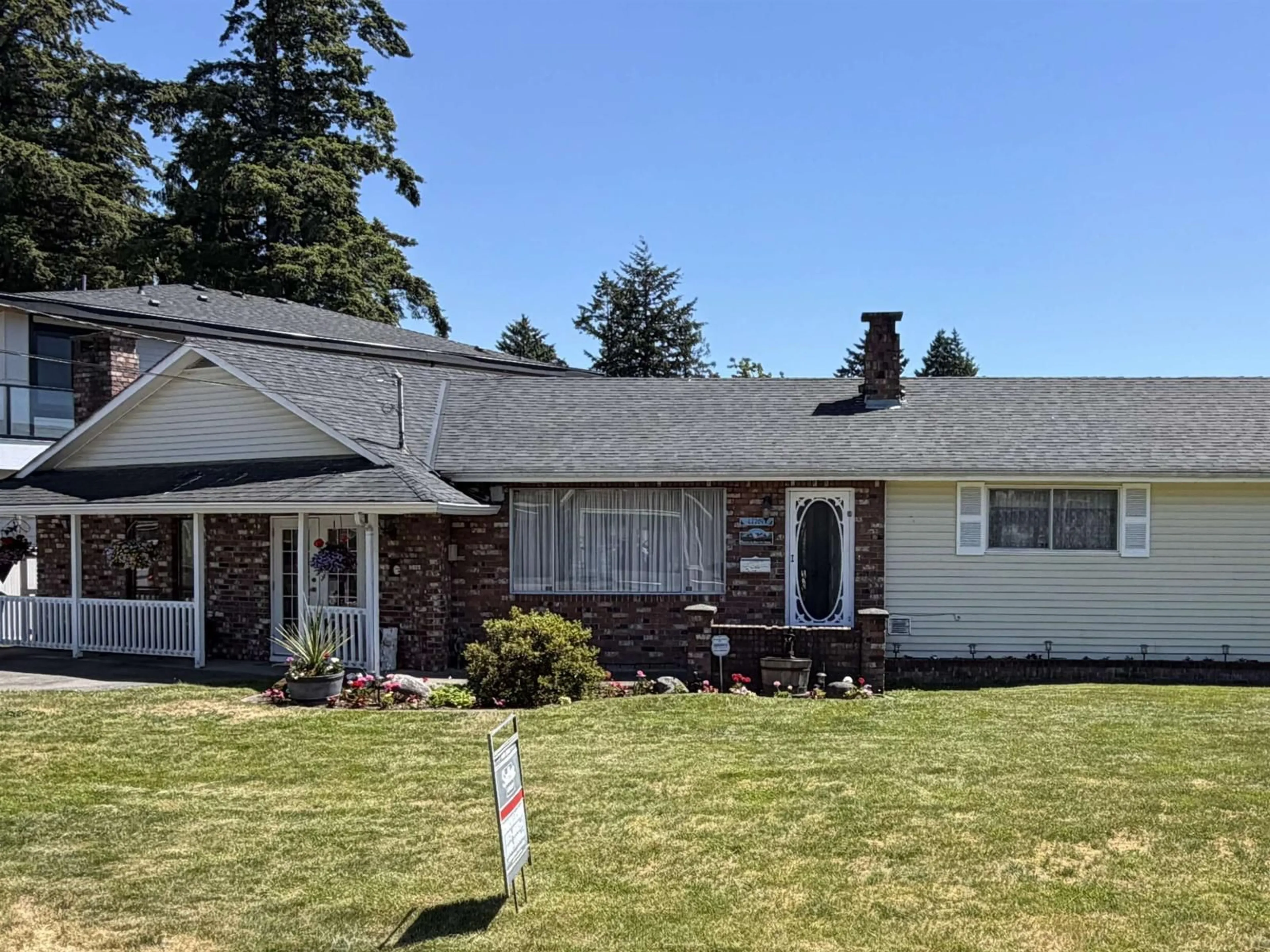 Home with vinyl exterior material, street for 12204 85A AVENUE, Surrey British Columbia V3W3H6