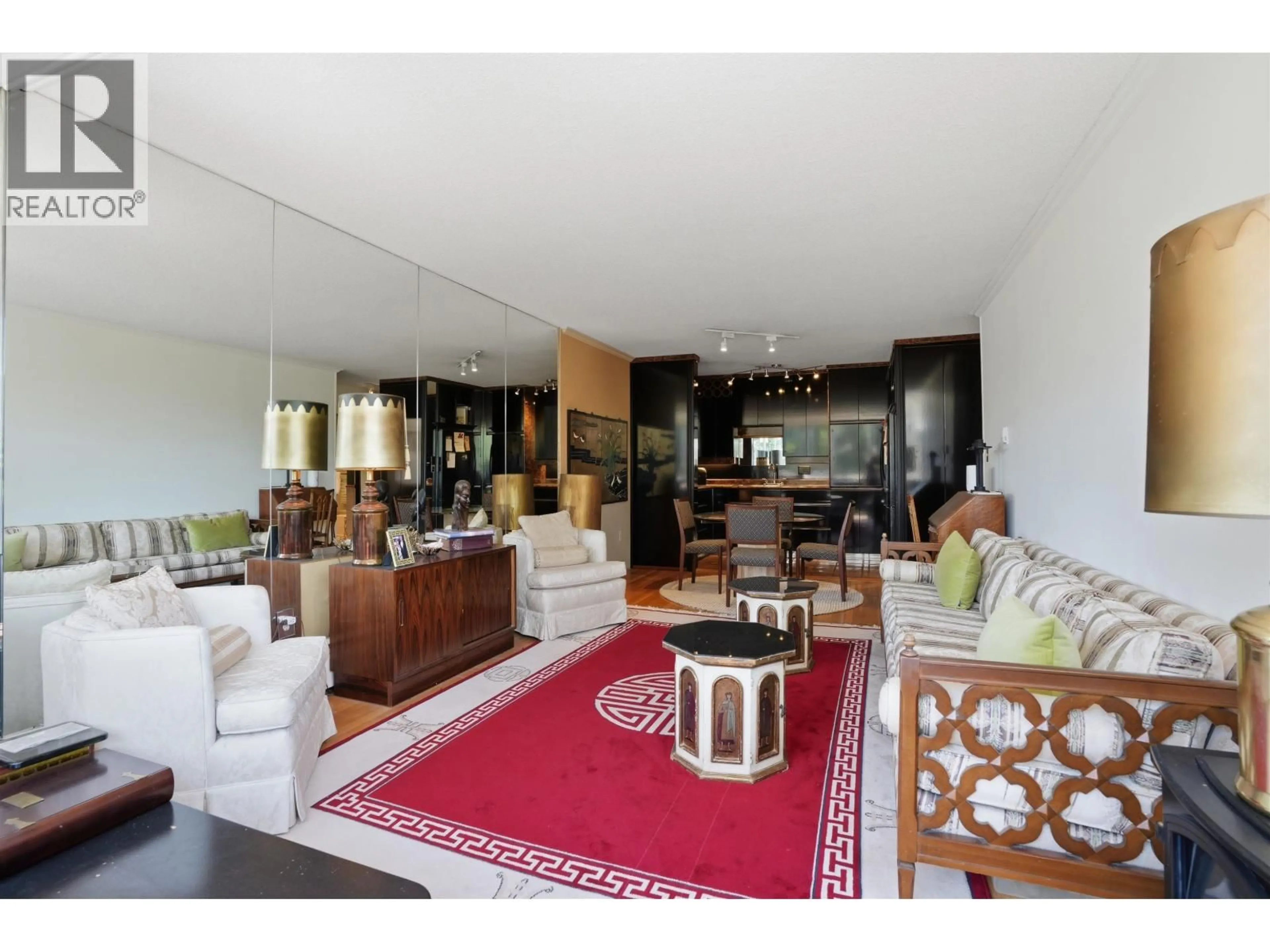 Living room with furniture, unknown for 215 - 1425 ESQUIMALT AVENUE, West Vancouver British Columbia V7T1L1