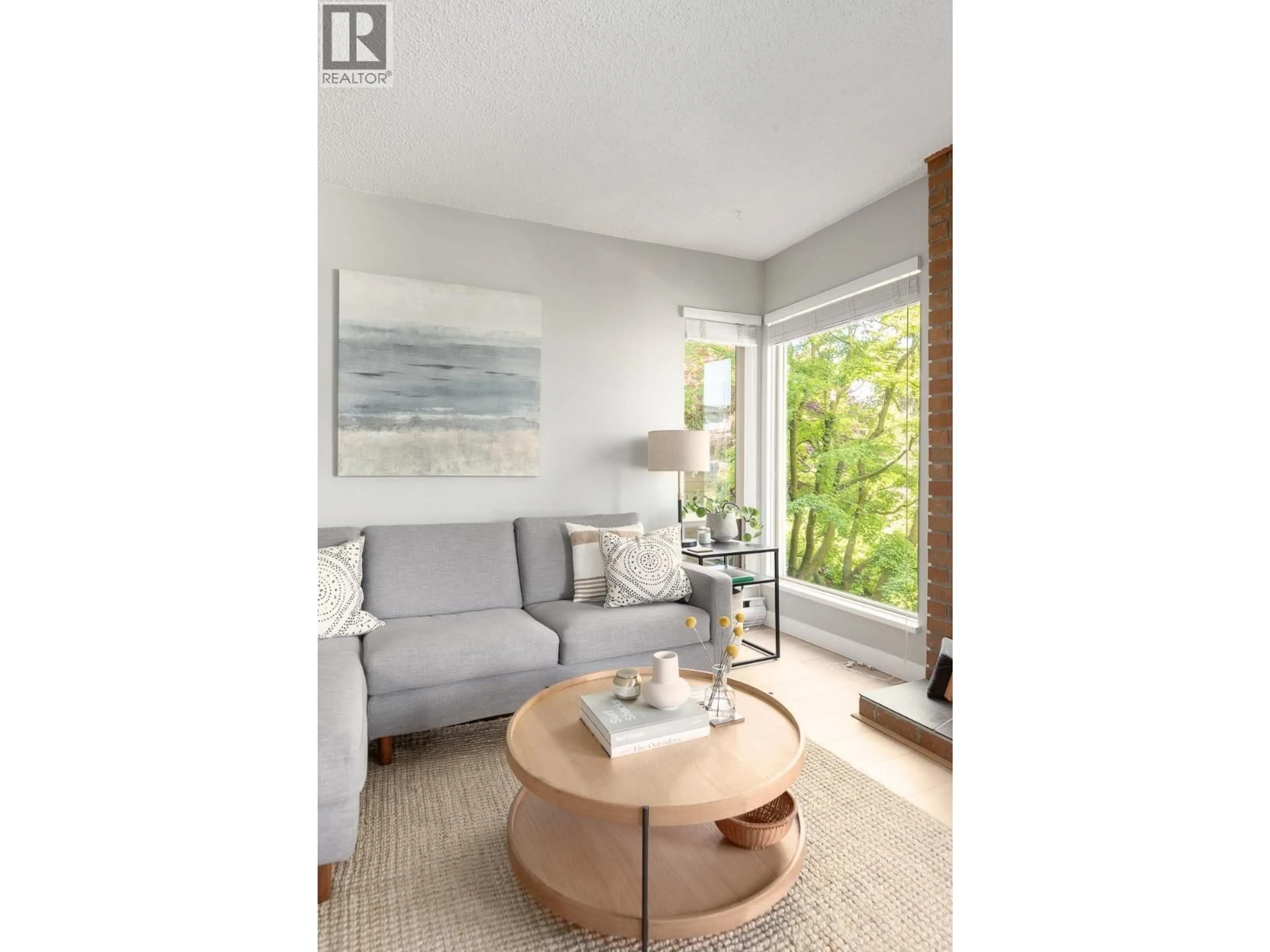 Living room with furniture, wood/laminate floor for 206 - 1260 10TH AVENUE, Vancouver British Columbia V6H1J3