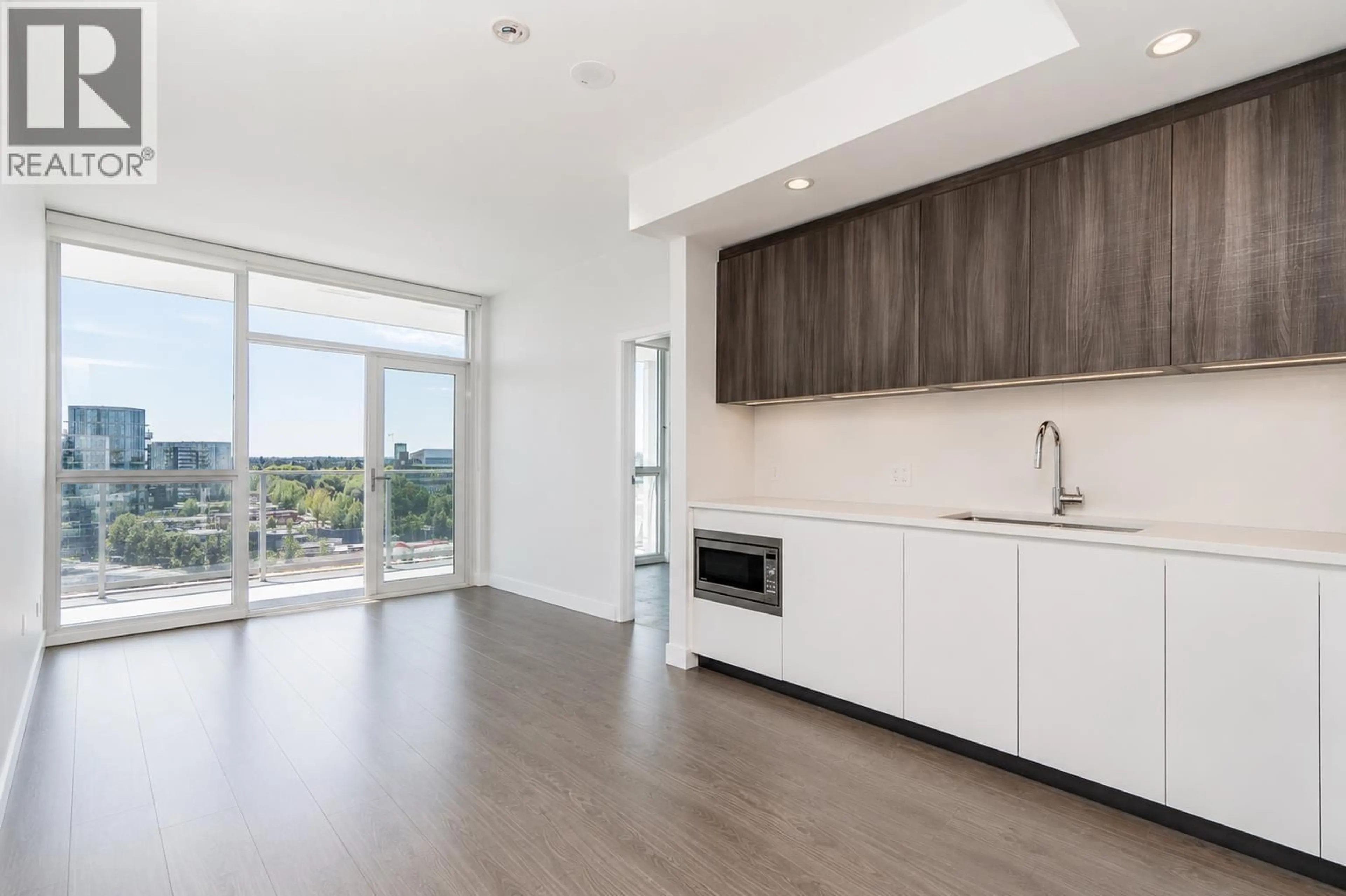 Open concept kitchen, wood/laminate floor for 1302 - 8133 COOK ROAD, Richmond British Columbia V6Y0L7