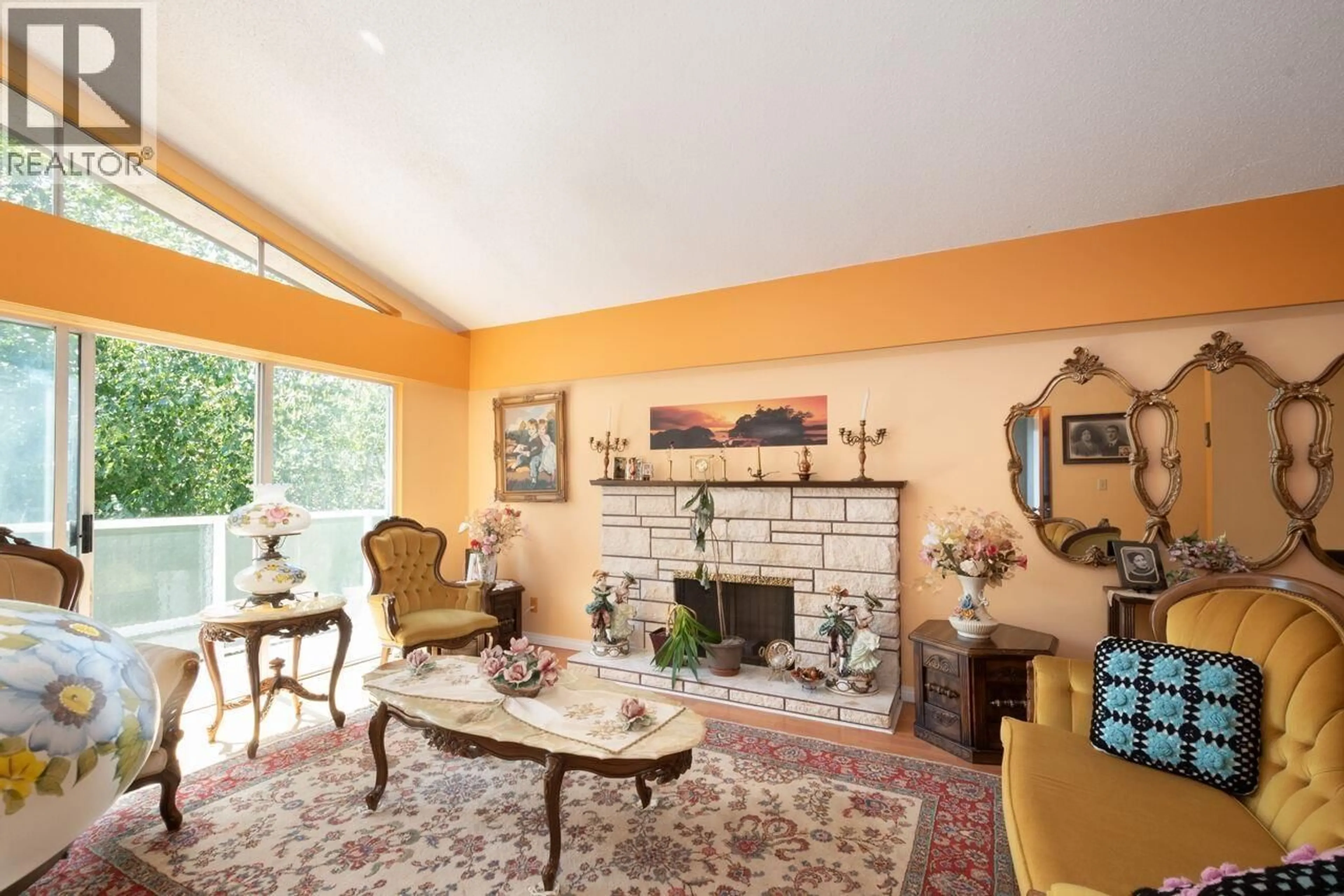 Living room with furniture, ceramic/tile floor for 4131 16TH AVENUE, Vancouver British Columbia V6R3E4