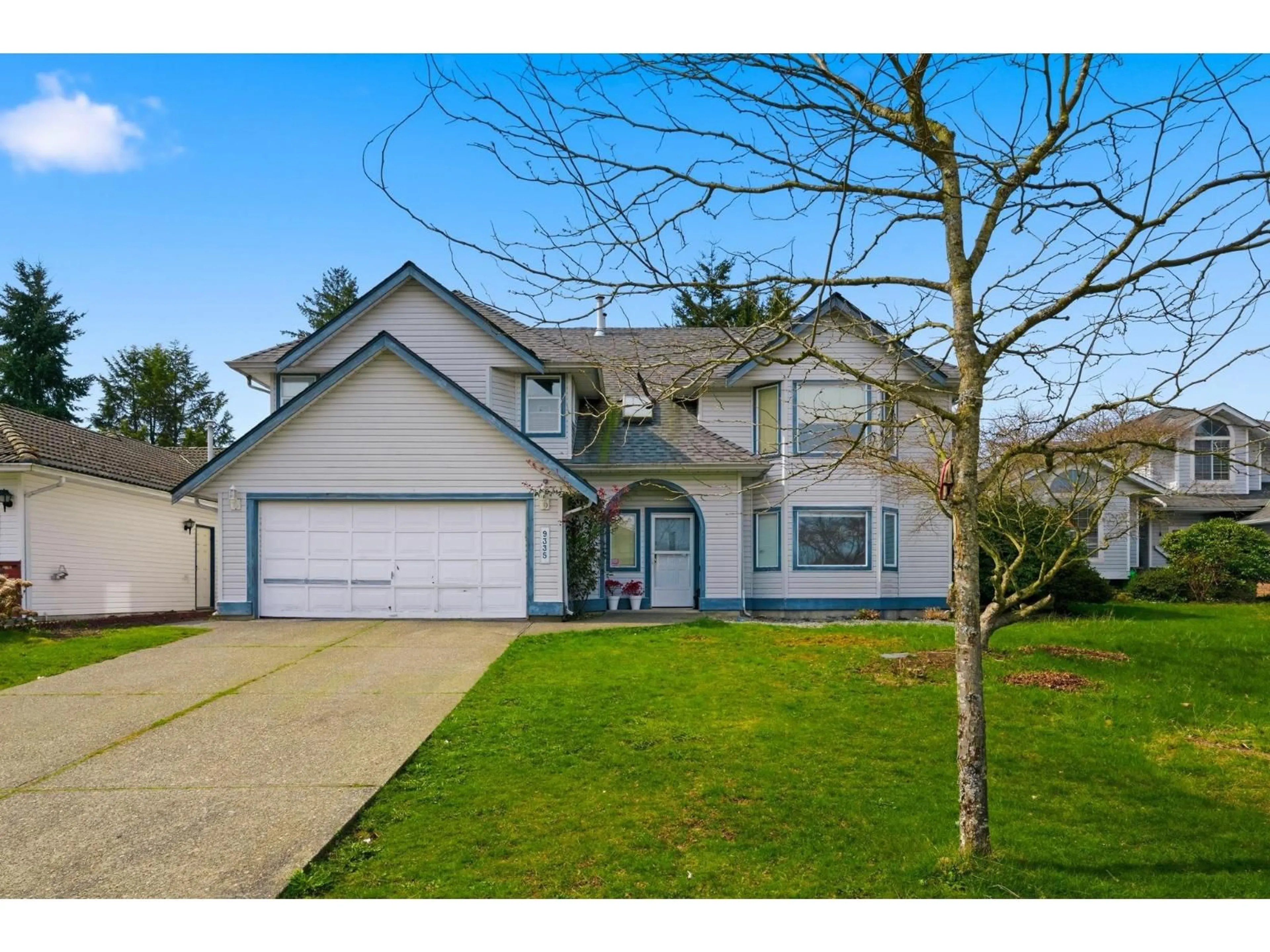 Home with vinyl exterior material, street for 9335 152A STREET, Surrey British Columbia V3R0E6
