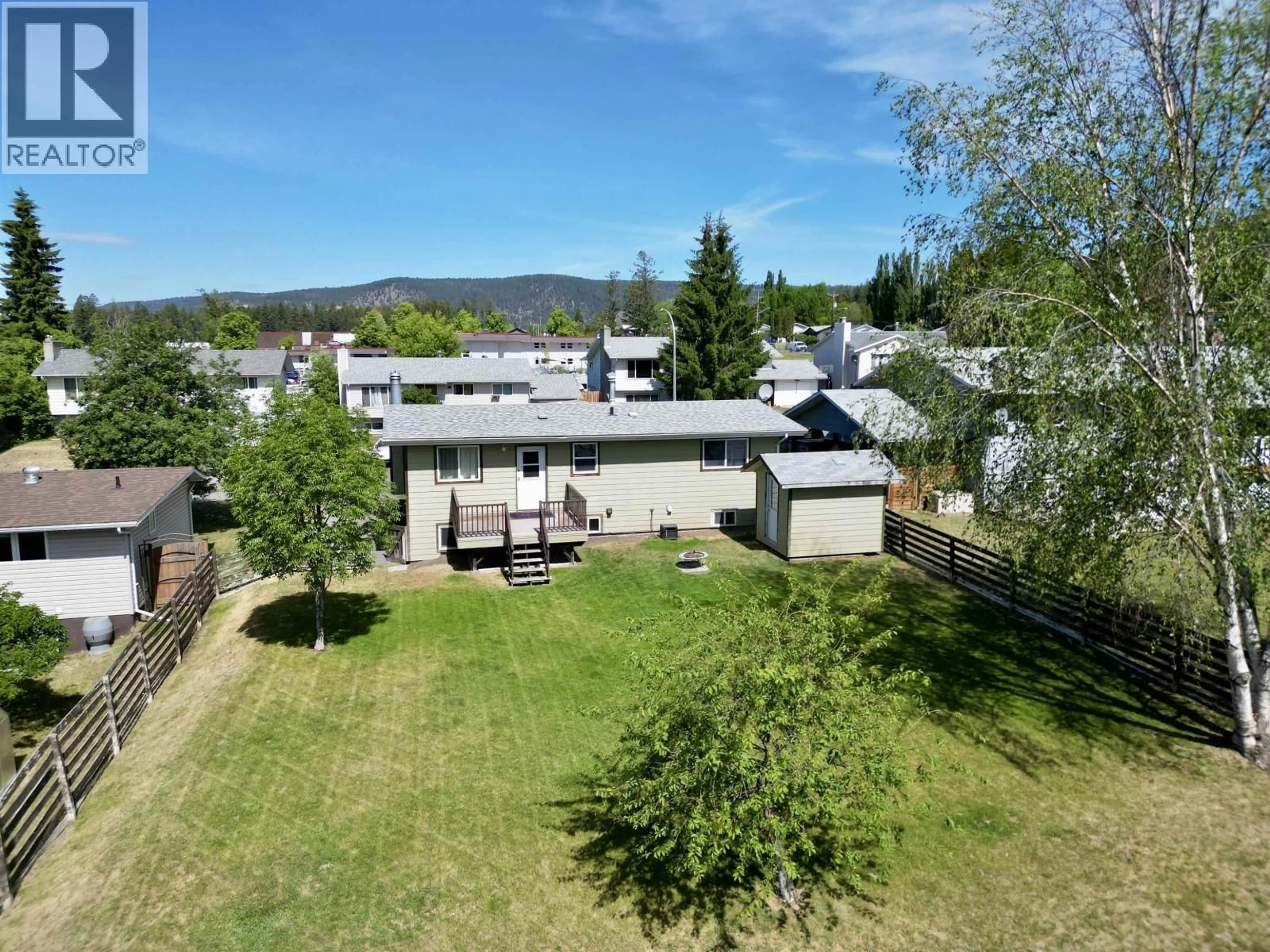 A pic from outside/outdoor area/front of a property/back of a property/a pic from drone, mountain view for 708 SMITH STREET, Williams Lake British Columbia V2G4A5