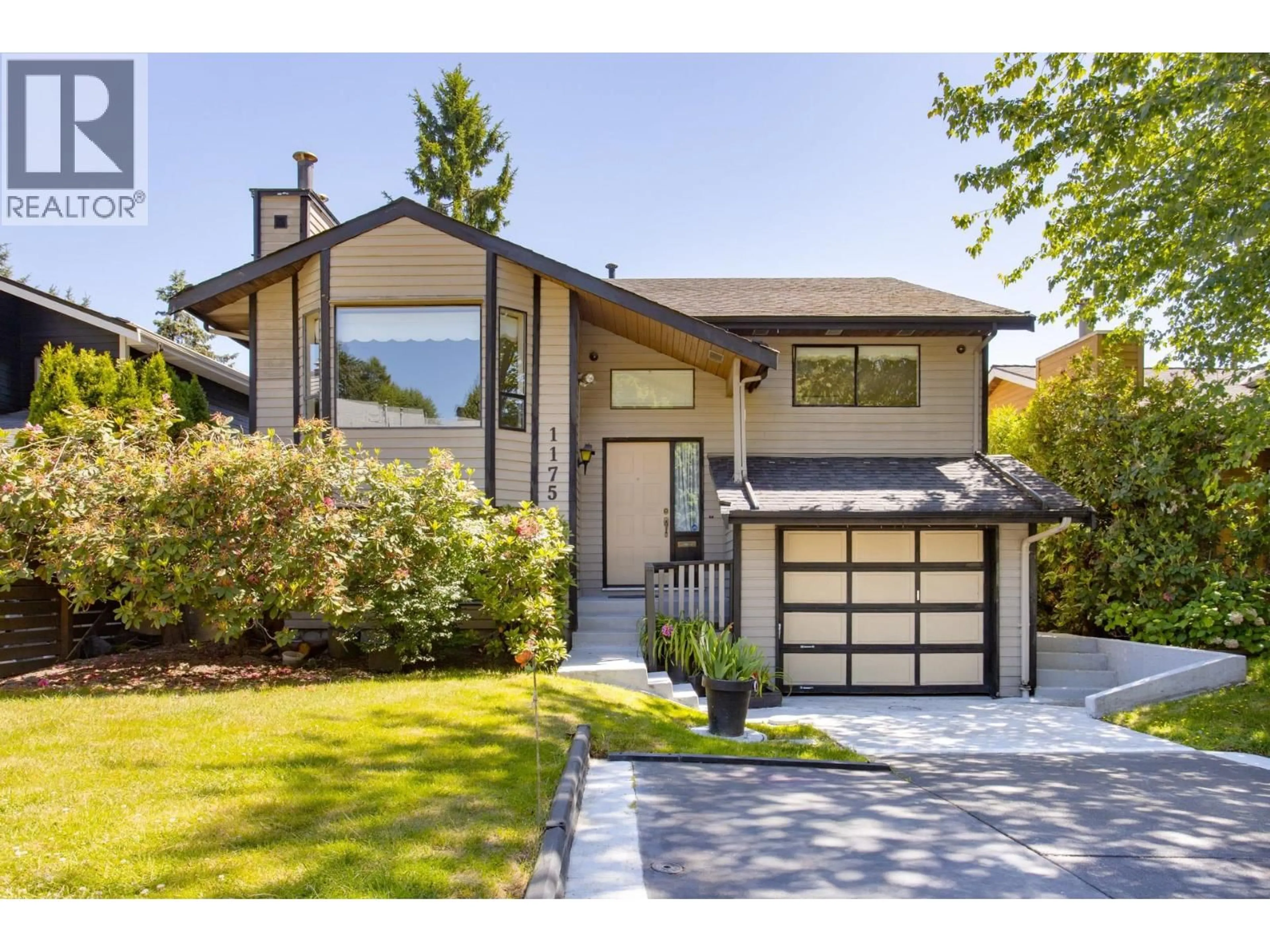 Home with vinyl exterior material, street for 1175 FALCON DRIVE, Coquitlam British Columbia V3E2C2