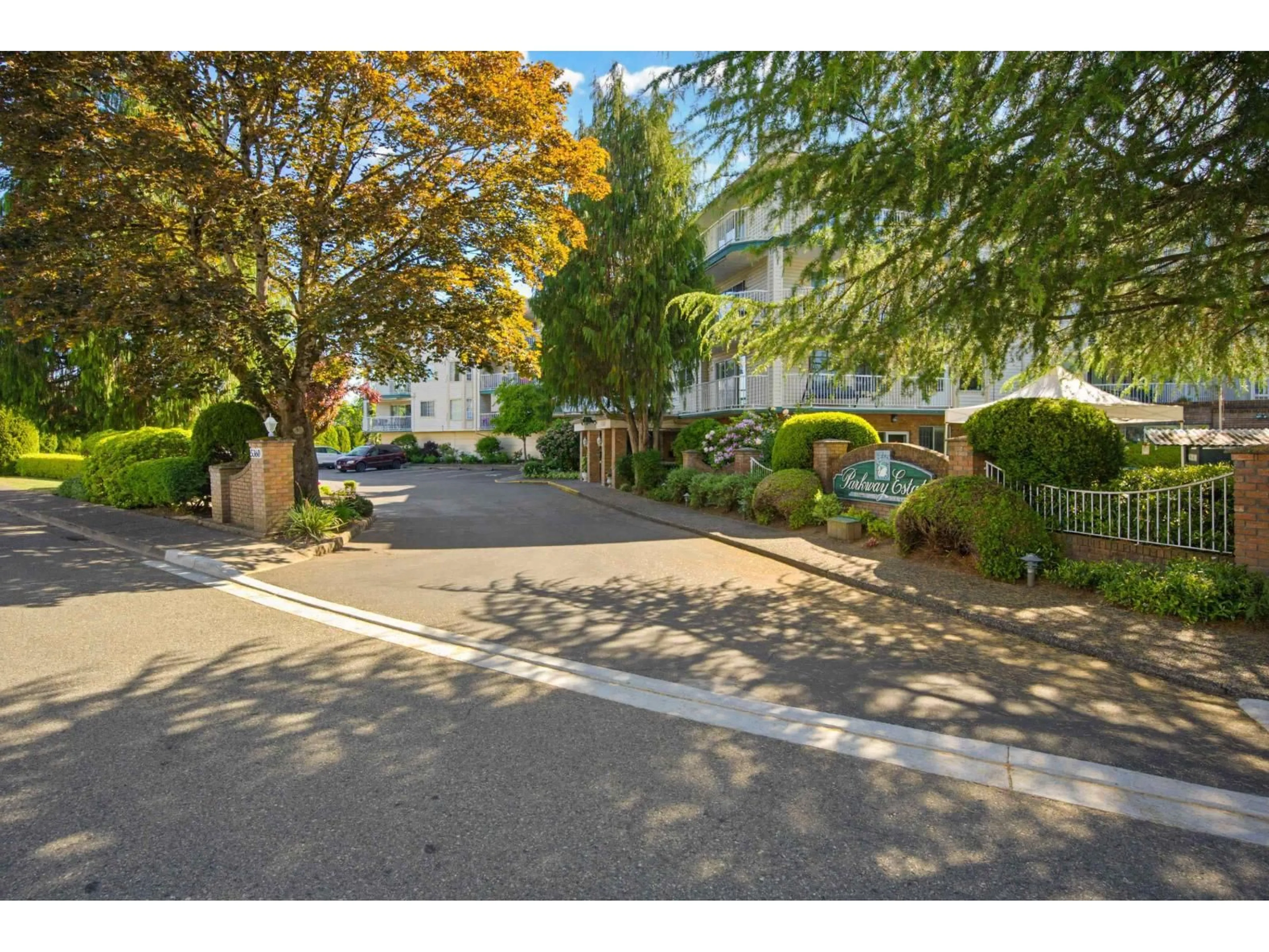 A pic from outside/outdoor area/front of a property/back of a property/a pic from drone, street for 105 - 5360 205 STREET, Langley British Columbia V3A7Y6