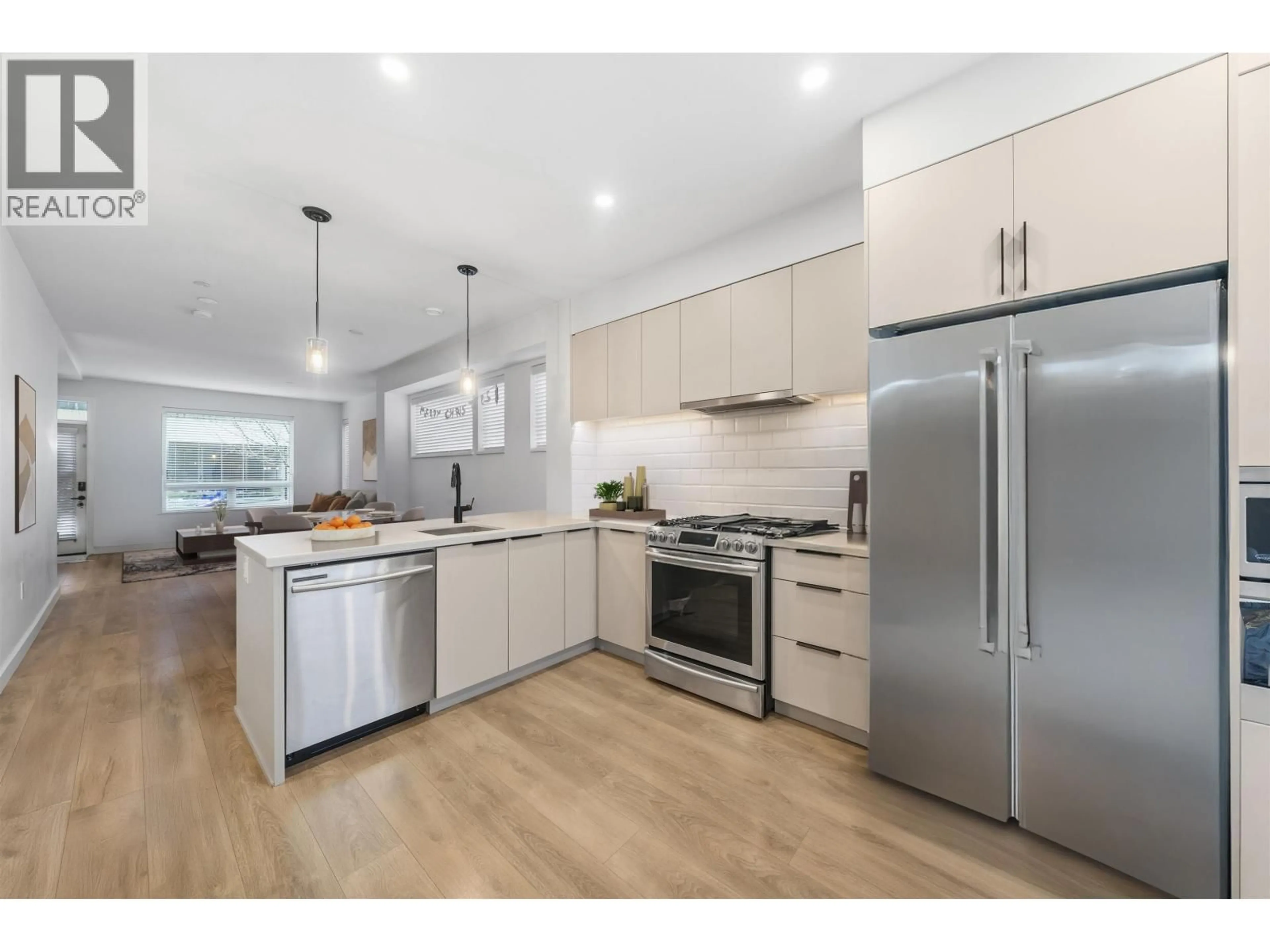 Open concept kitchen, wood/laminate floor for 601 - 3021 ST GEORGE STREET, Port Moody British Columbia V3H0K3