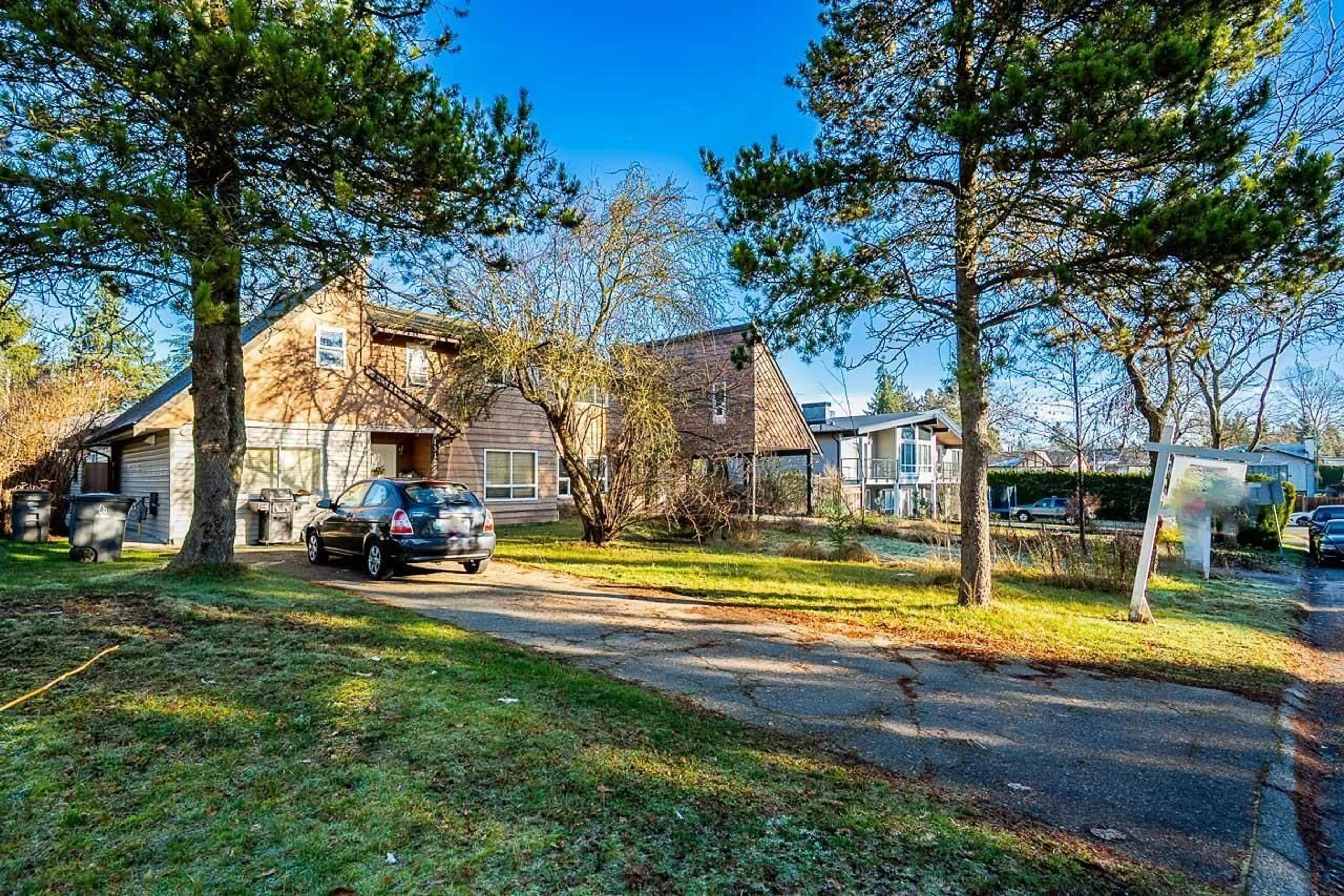 A pic from outside/outdoor area/front of a property/back of a property/a pic from drone, street for 13125 BALLOCH DRIVE, Surrey British Columbia V3V6Y2