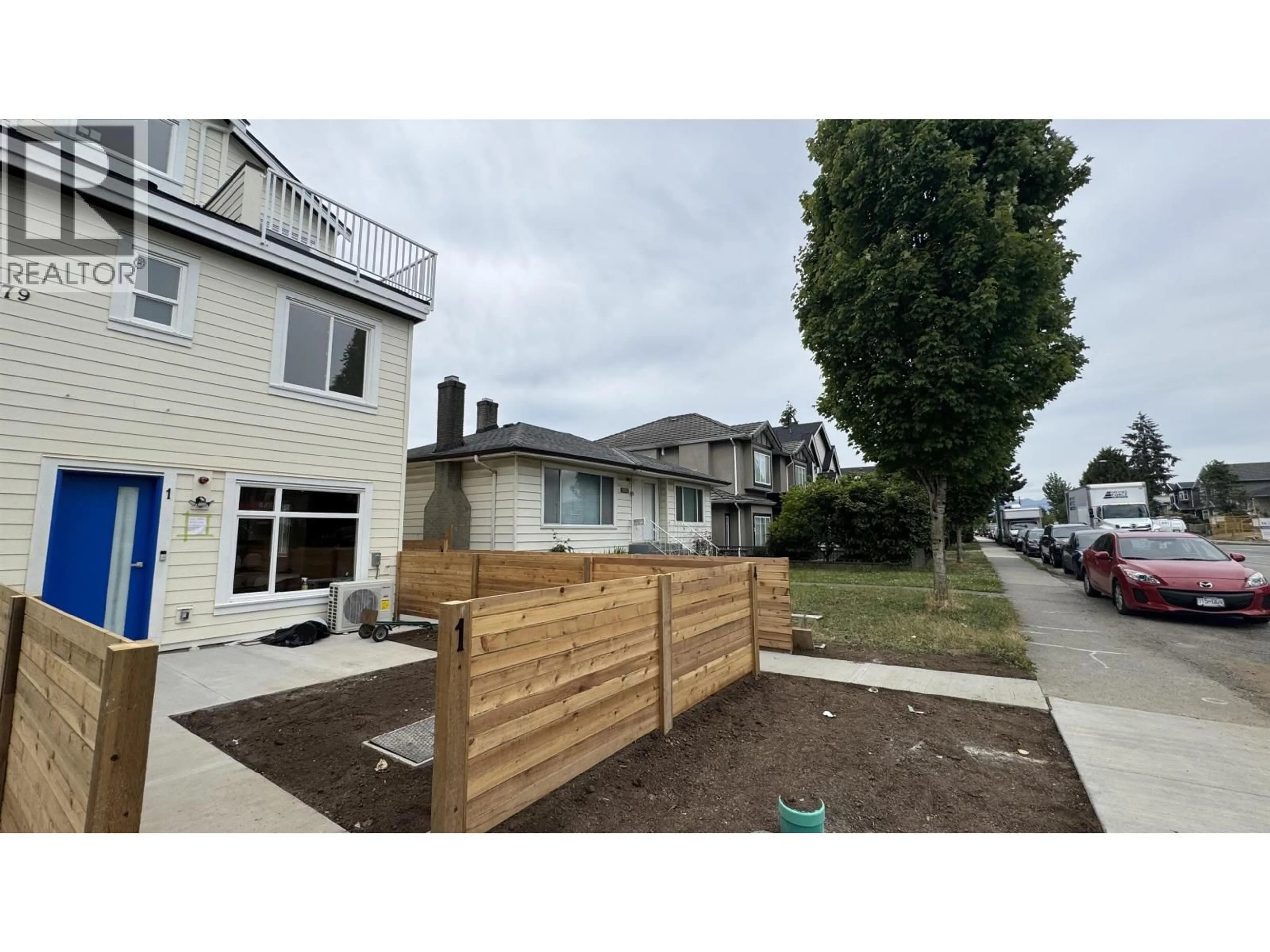 A pic from outside/outdoor area/front of a property/back of a property/a pic from drone, street for 1 - 5779 CLARENDON STREET, Vancouver British Columbia V5R3K4