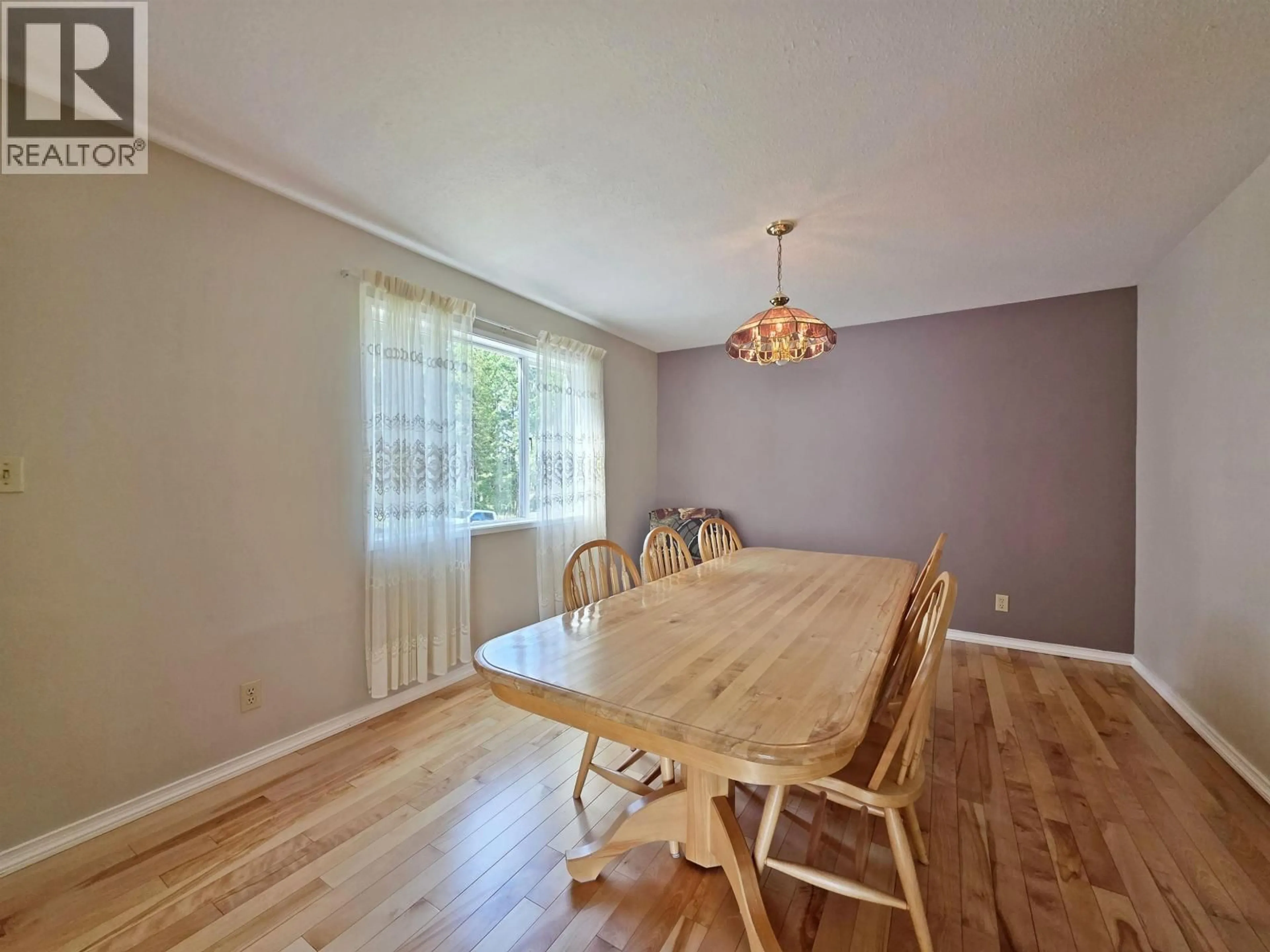 Dining room, wood/laminate floor for 4667 LUND ROAD, Quesnel British Columbia V2J6M8