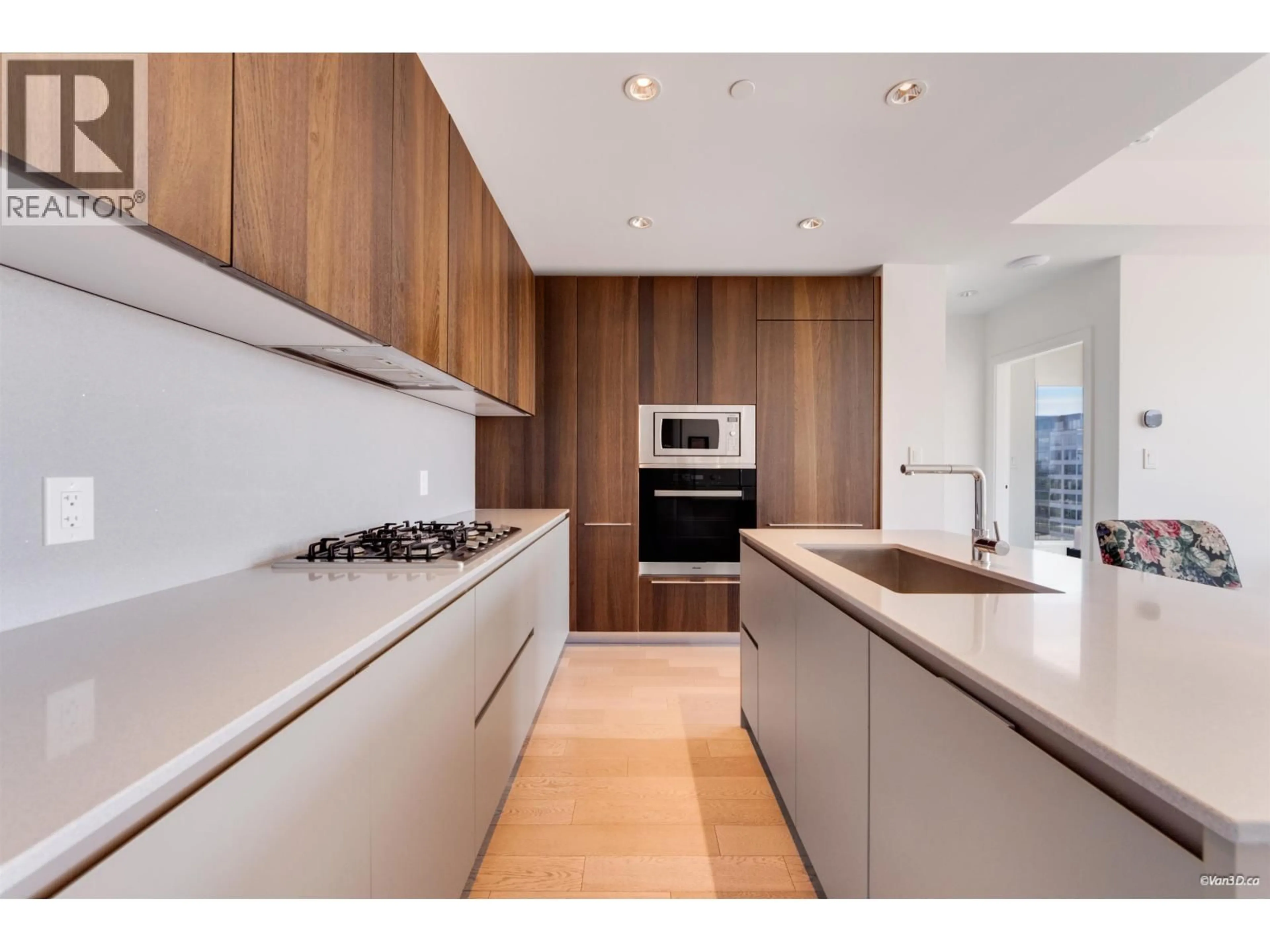 Contemporary kitchen, wood/laminate floor for 1007 - 6688 PEARSON WAY, Richmond British Columbia V7C0E5