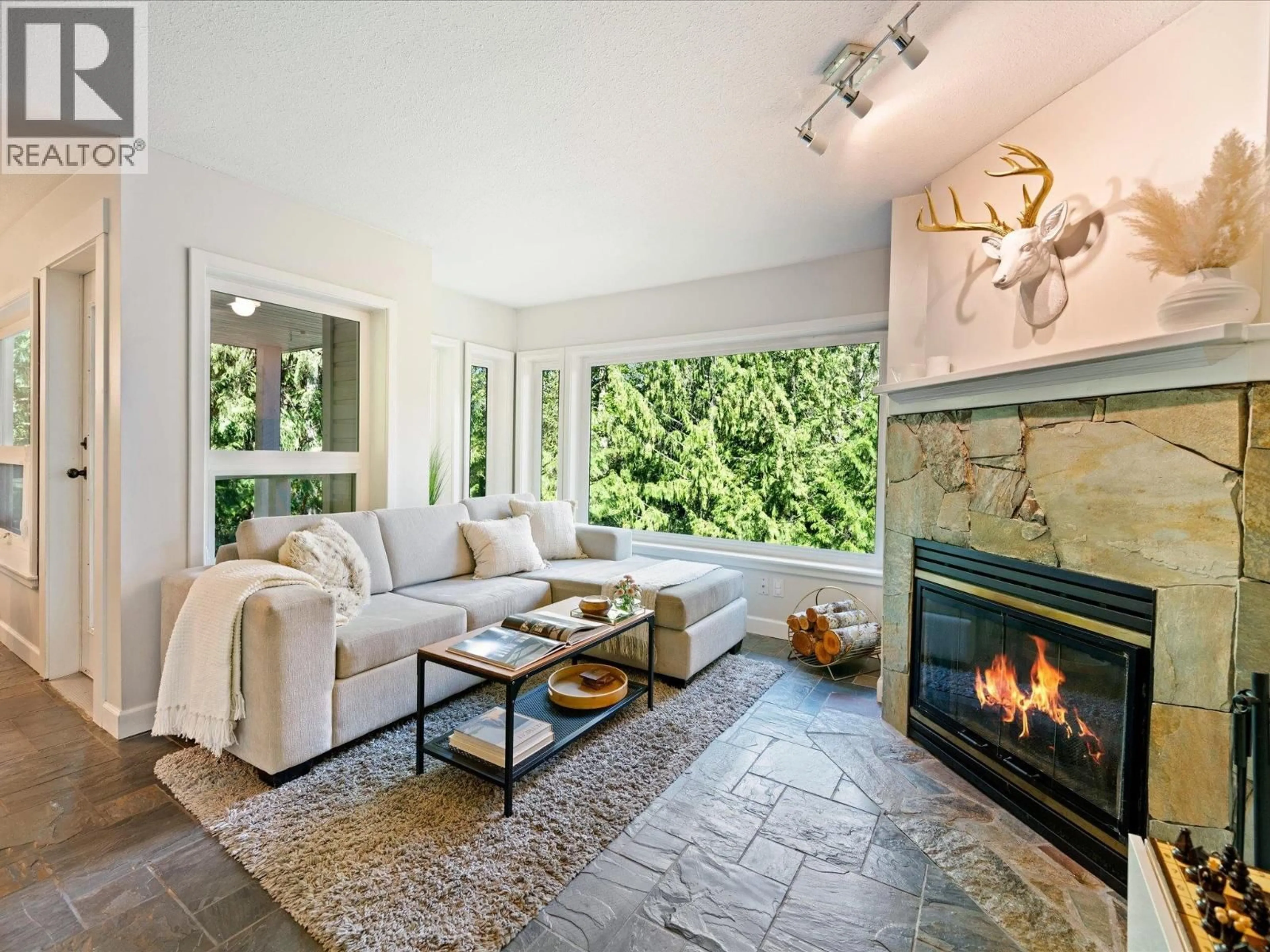 Living room with furniture, ceramic/tile floor for 1 - 2240 GONDOLA WAY, Whistler British Columbia V8E0N1