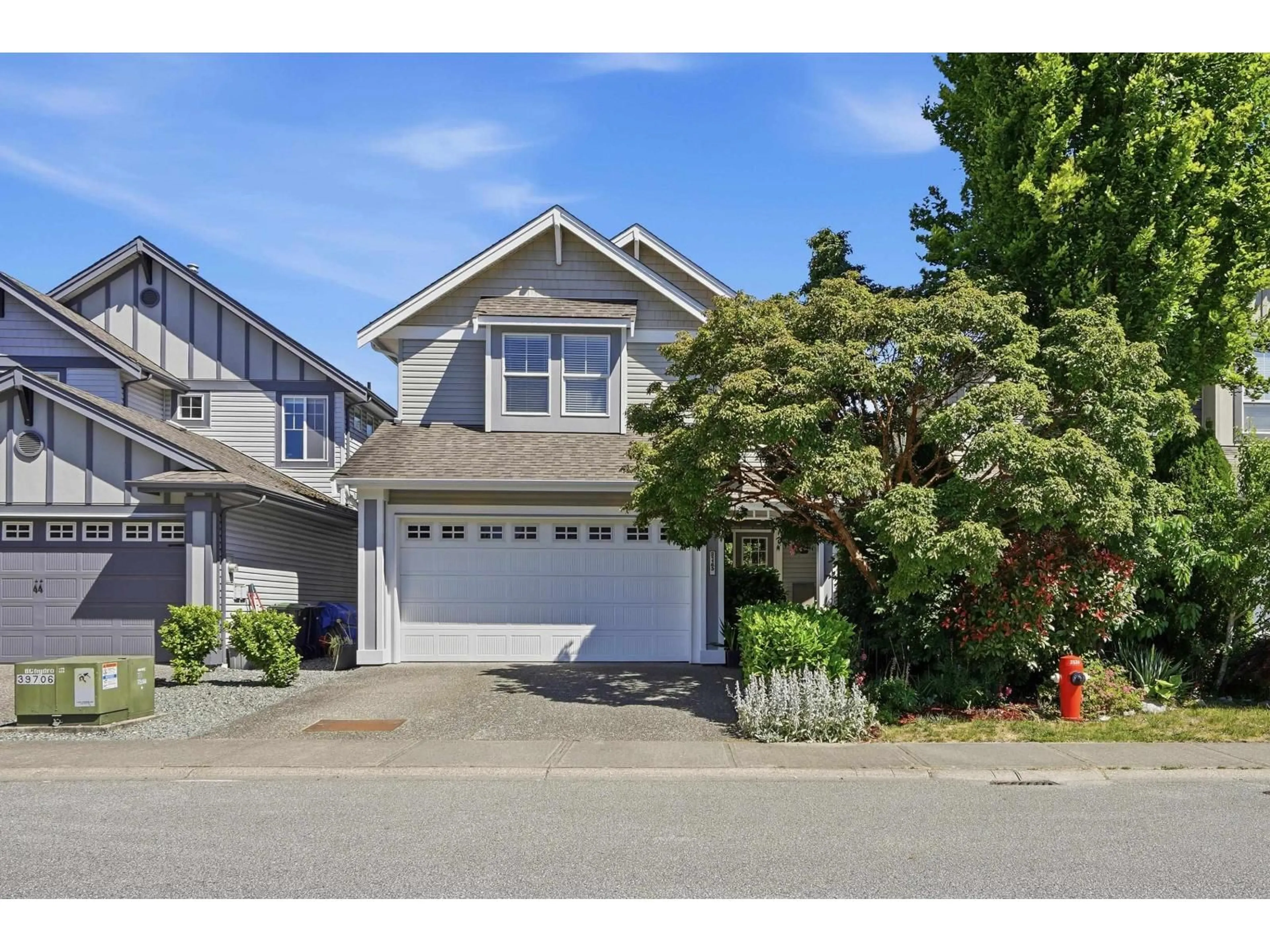 Home with vinyl exterior material, street for 21163 82A AVENUE, Langley British Columbia V2Y0B5