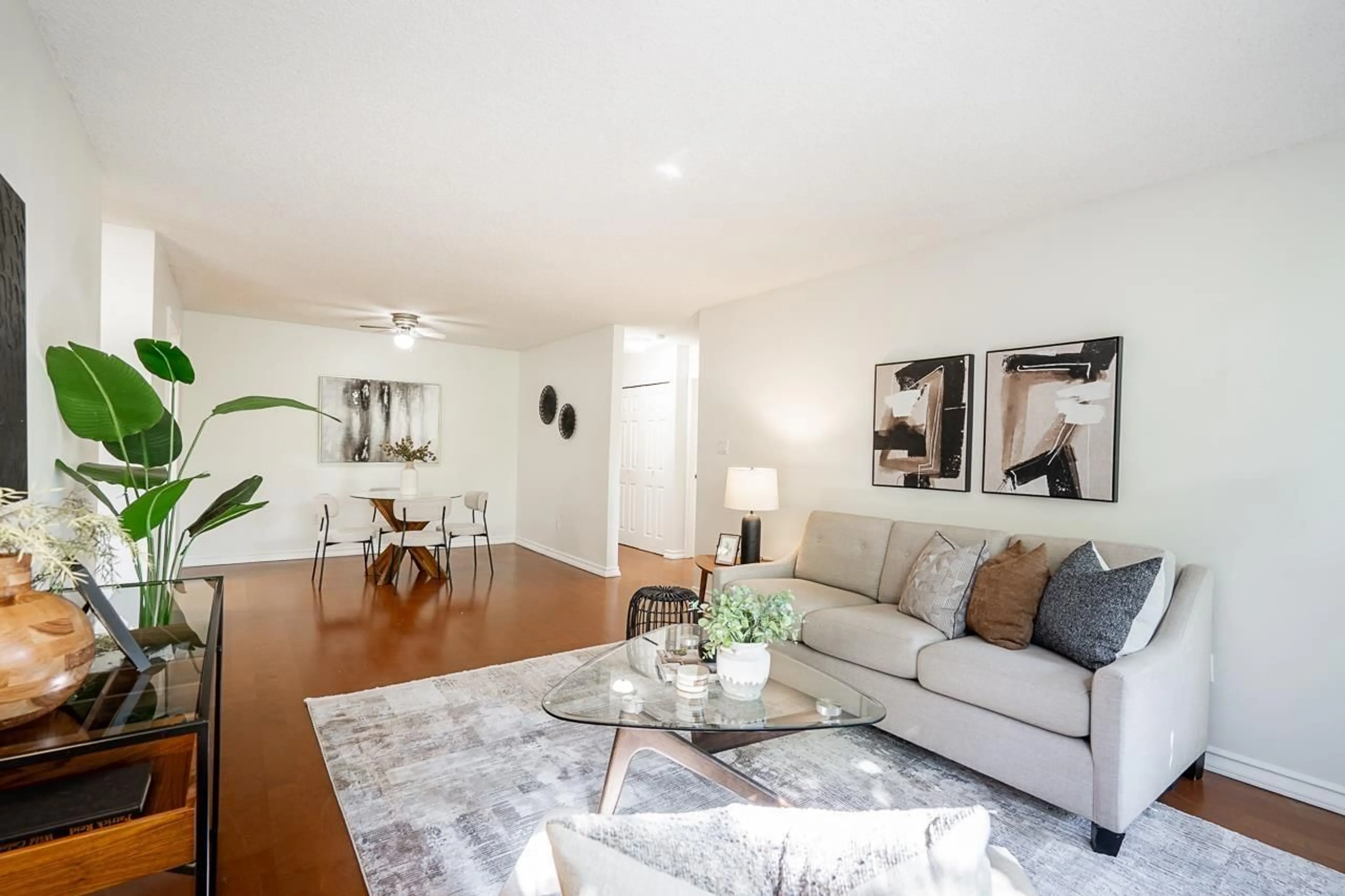 Living room with furniture, wood/laminate floor for 306 - 10680 151A STREET, Surrey British Columbia V3R8T4