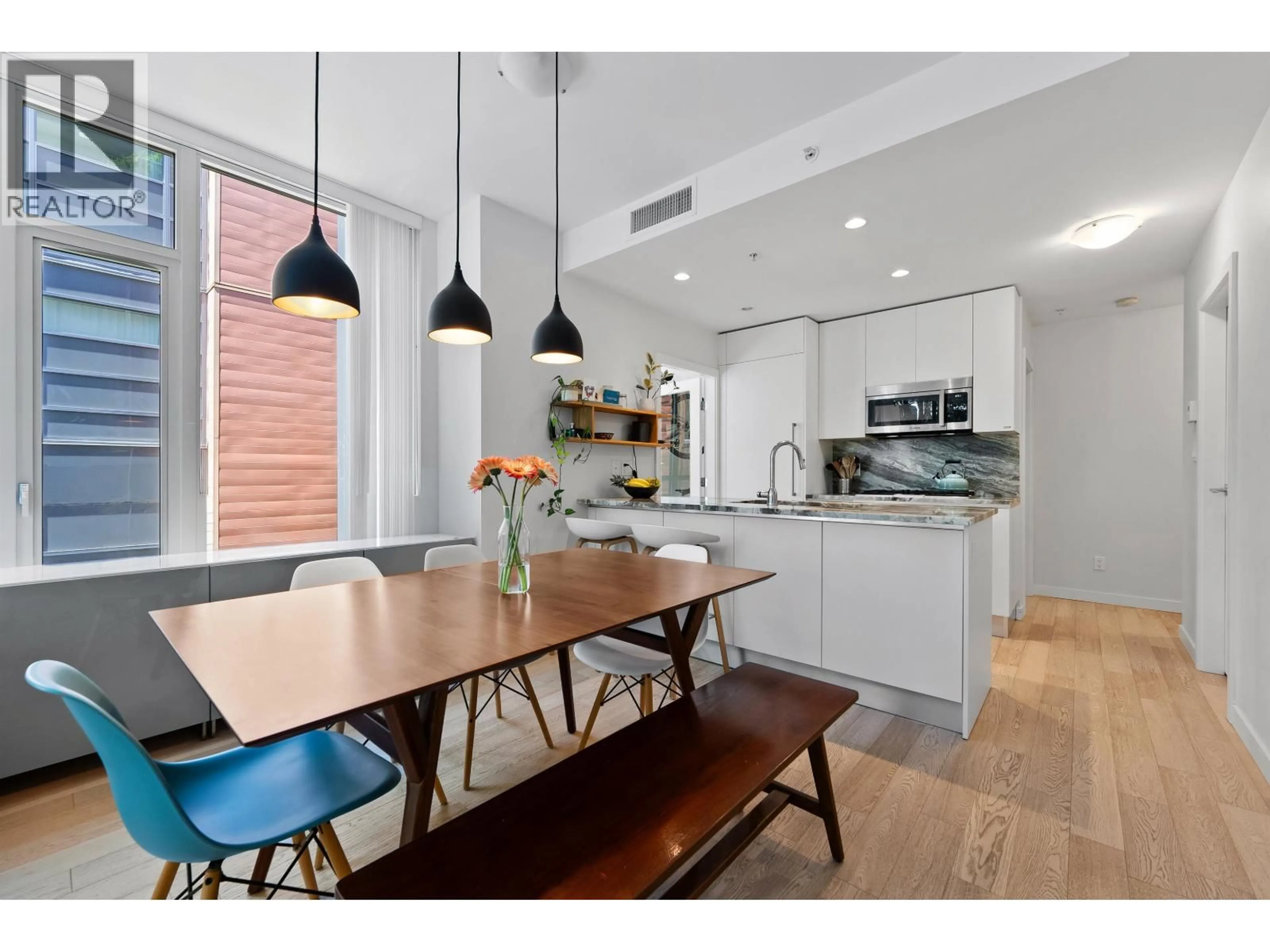 Open concept kitchen, wood/laminate floor for 308 - 2565 MAPLE STREET, Vancouver British Columbia V7J0C8