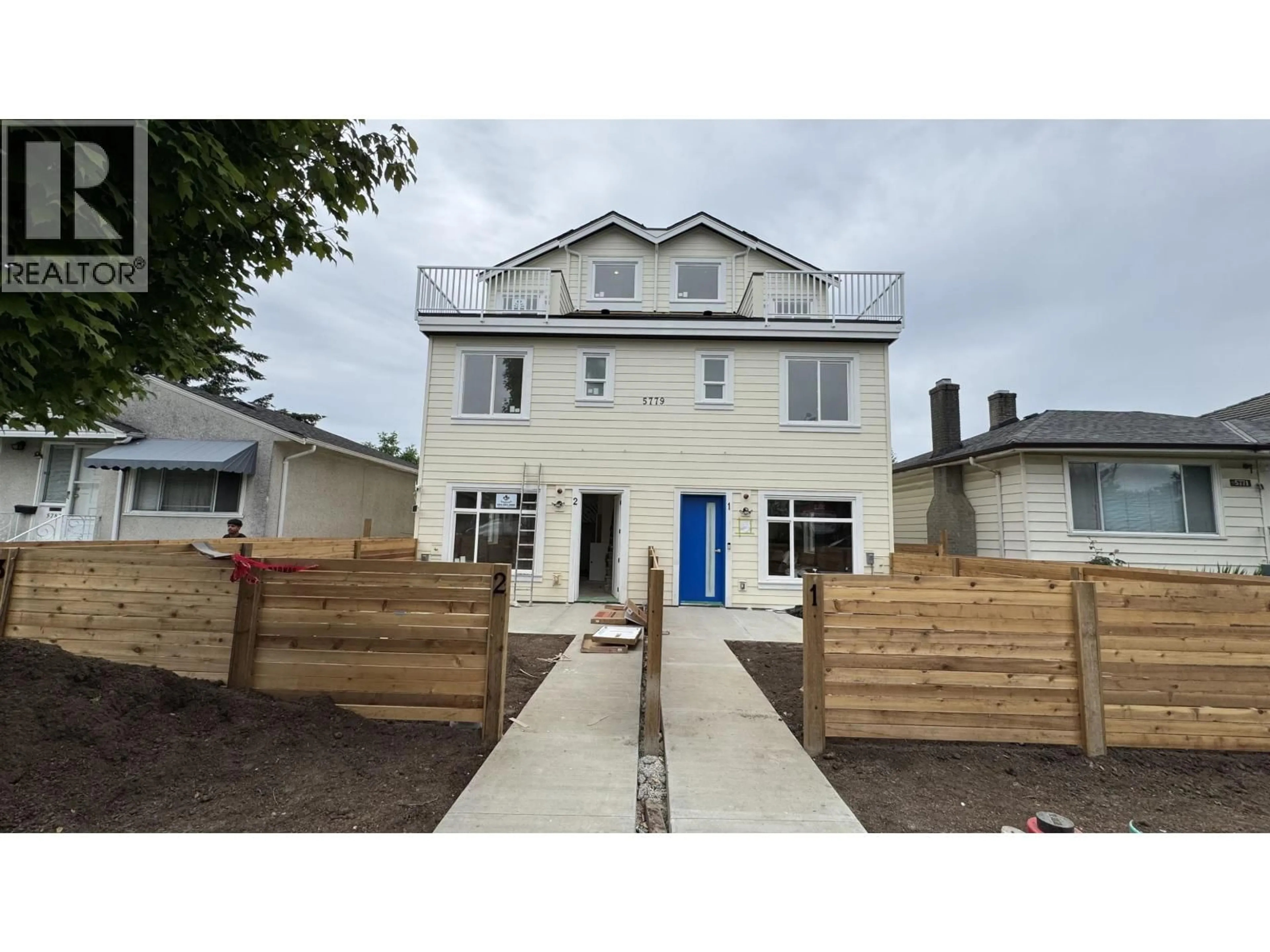 A pic from outside/outdoor area/front of a property/back of a property/a pic from drone, building for 4 - 5779 CLARENDON STREET, Vancouver British Columbia V5R3K4