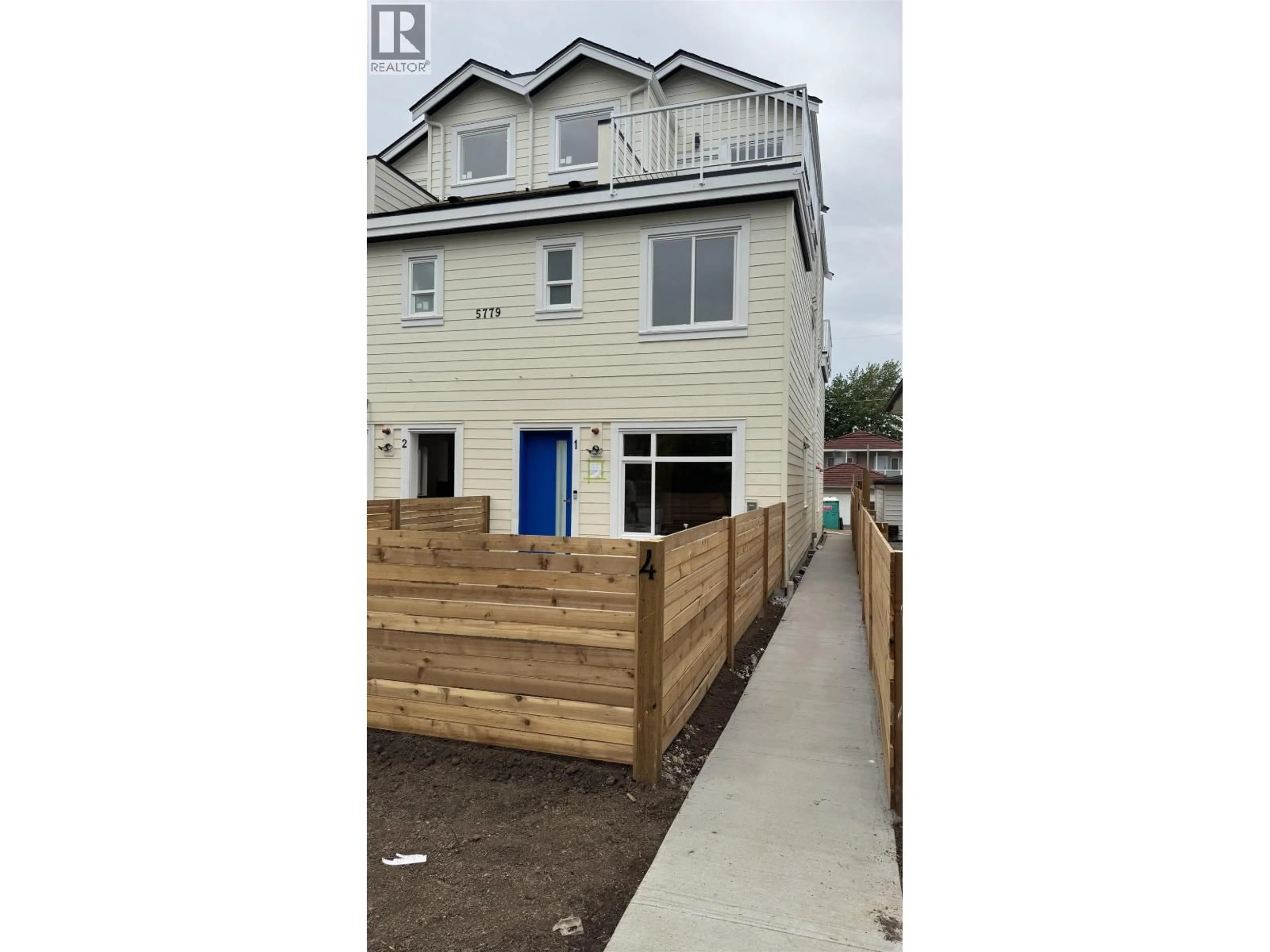 A pic from outside/outdoor area/front of a property/back of a property/a pic from drone, street for 4 - 5779 CLARENDON STREET, Vancouver British Columbia V5R3K4