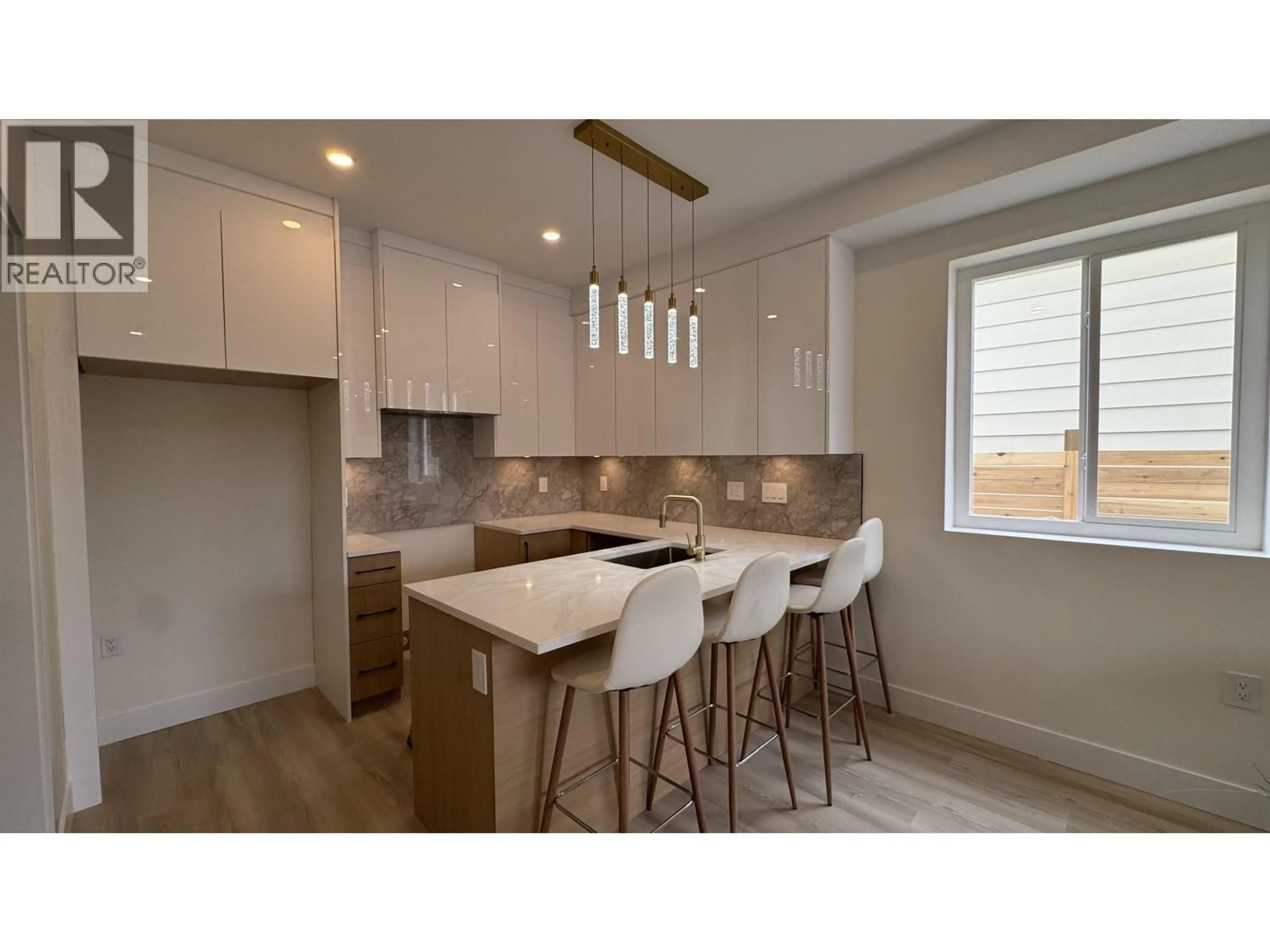 Open concept kitchen, unknown for 4 - 5779 CLARENDON STREET, Vancouver British Columbia V5R3K4