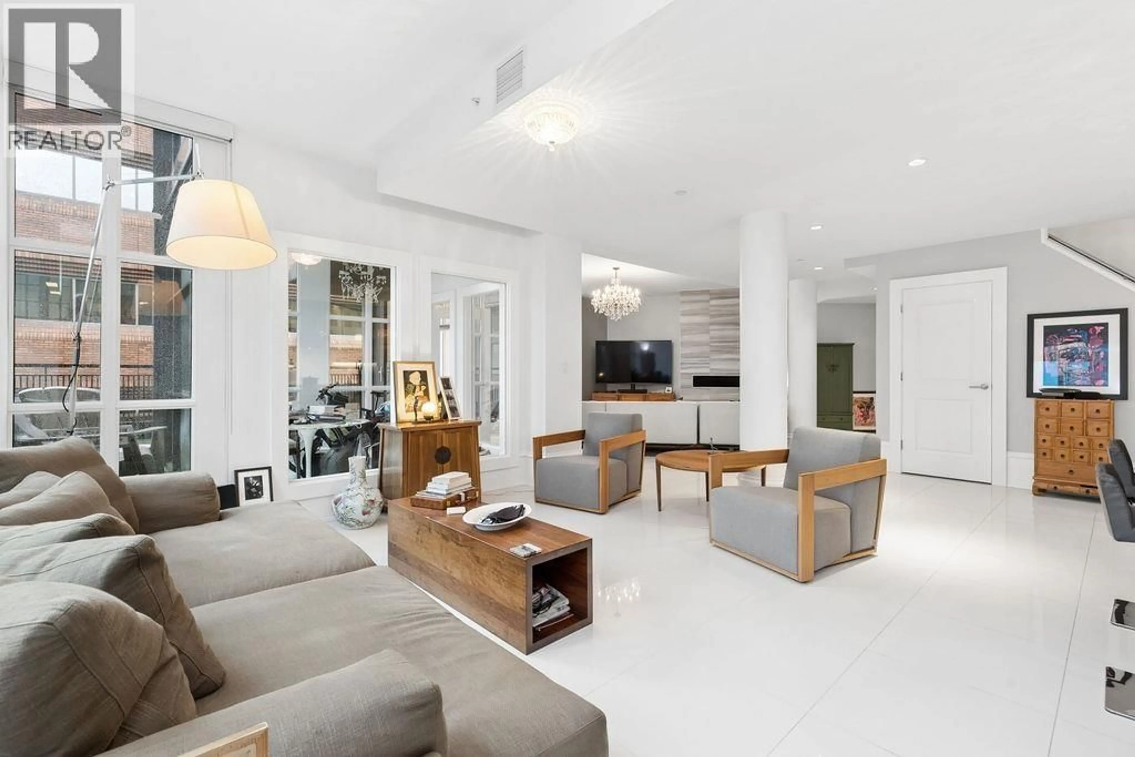 Living room with furniture, cement floor for PH2 - 1102 HORNBY STREET, Vancouver British Columbia V6Z1V8