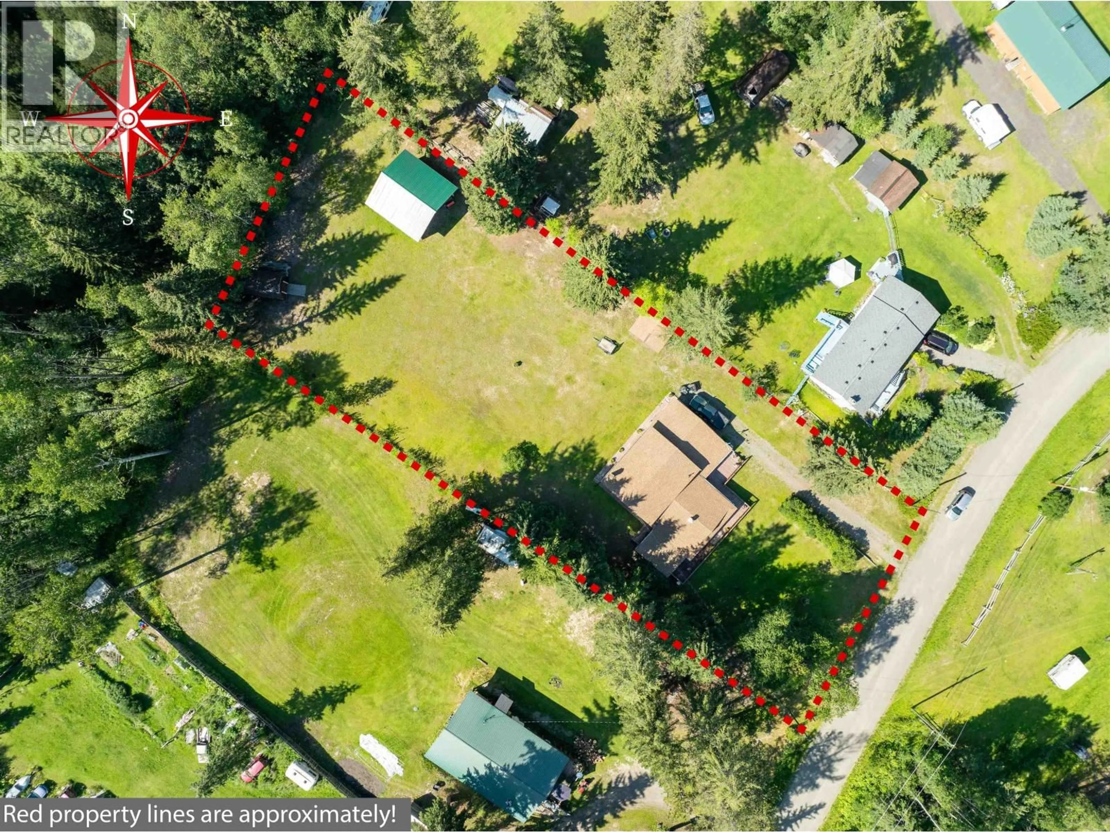 A pic from outside/outdoor area/front of a property/back of a property/a pic from drone, forest/trees view for 4312 KOKANEE ROAD, Canim Lake British Columbia V0K1J0