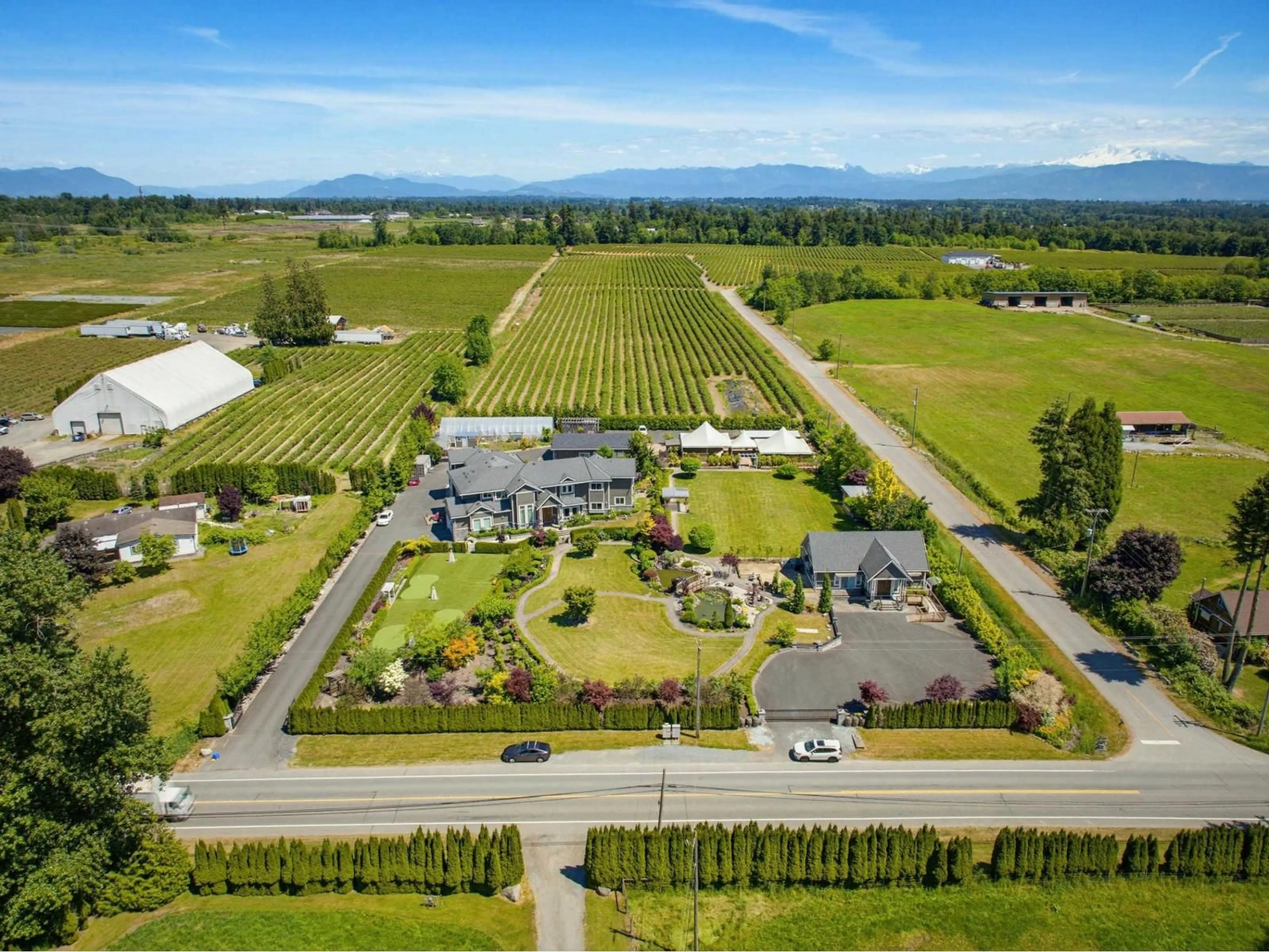 A pic from outside/outdoor area/front of a property/back of a property/a pic from drone, mountain view for 2218 240 STREET, Langley British Columbia V2Z3A4