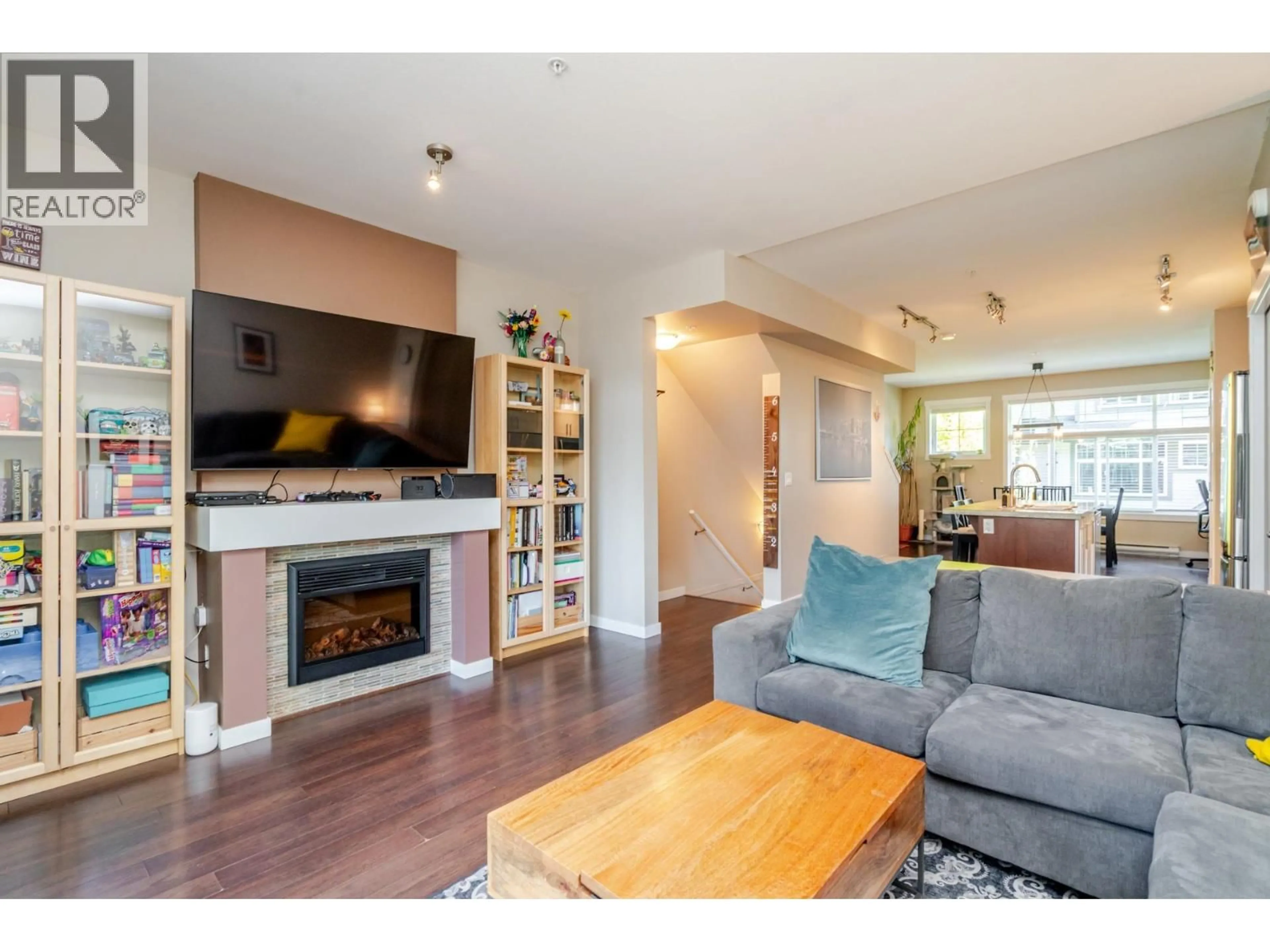 Living room with furniture, wood/laminate floor for 99 - 13819 232 STREET, Maple Ridge British Columbia V4R0C7