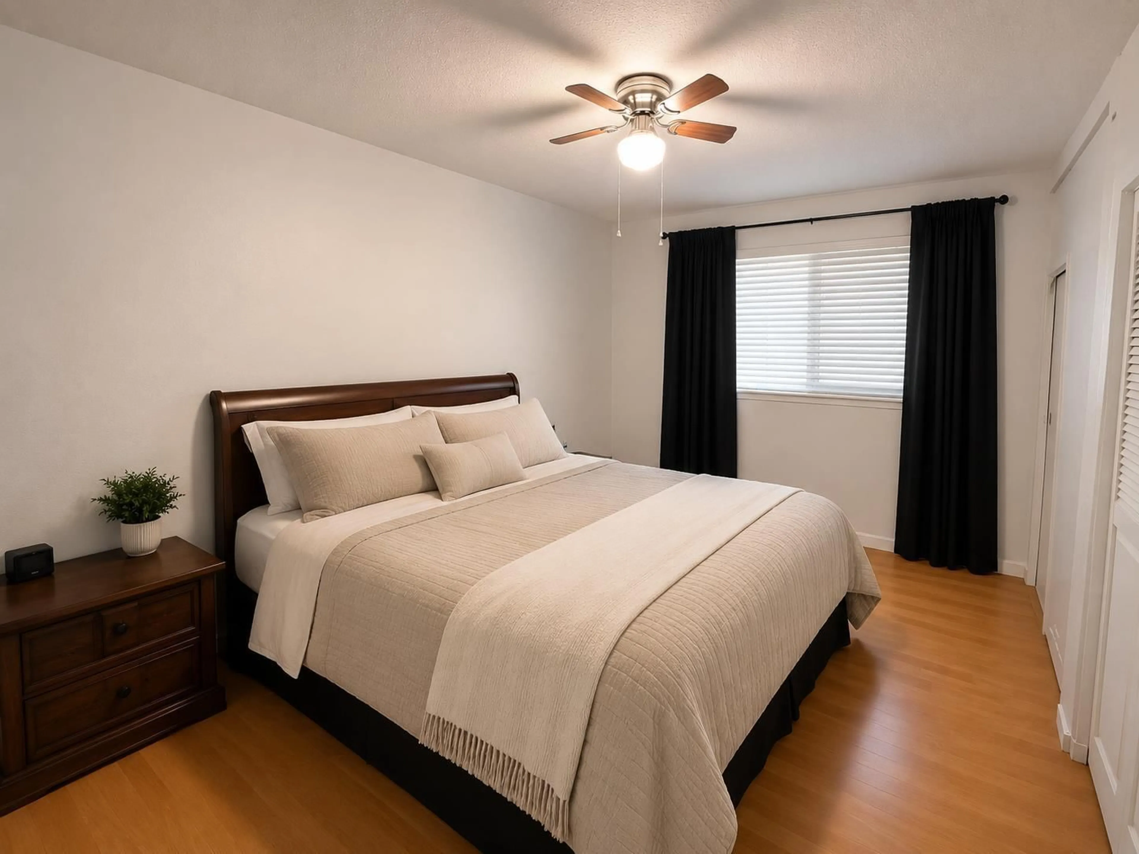 Bedroom with bed, wood/laminate floor for 4660 207B STREET, Langley British Columbia V3A7P1