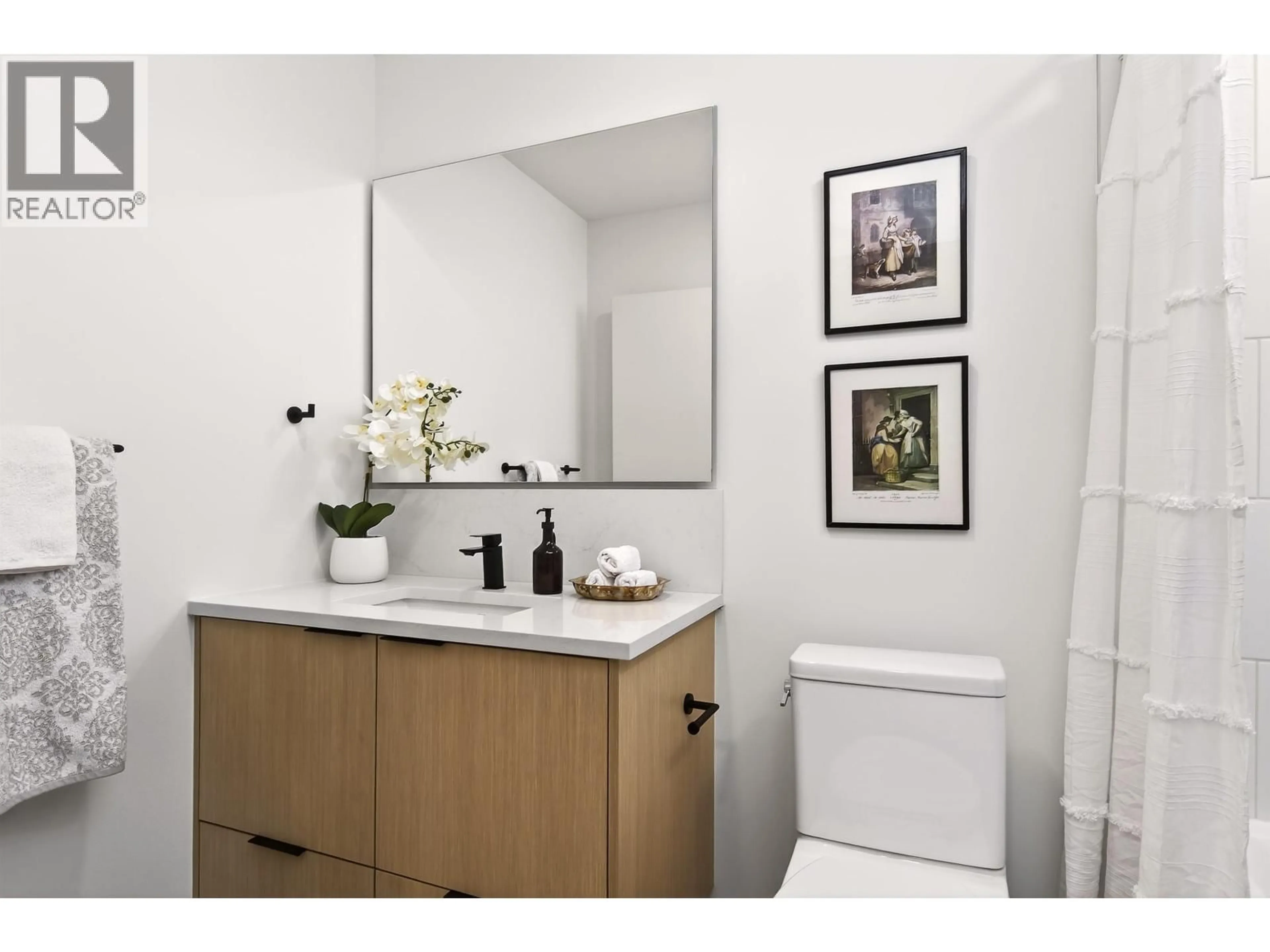 Standard bathroom, ceramic/tile floor for 204 - 333 ST. DAVIDS AVENUE, North Vancouver British Columbia V7L3N7