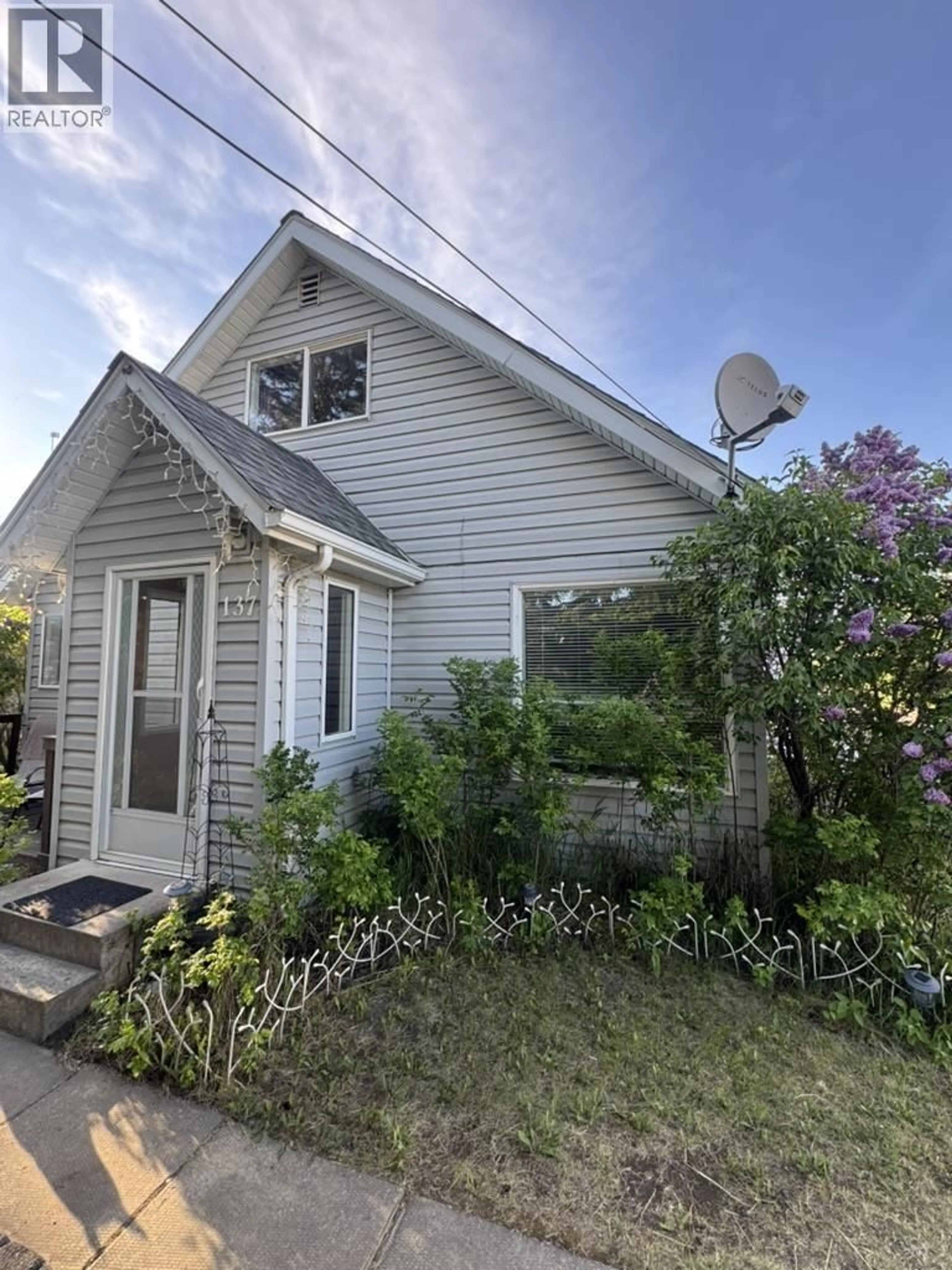 Home with vinyl exterior material, street for 137 VICTORIA STREET, Vanderhoof British Columbia V0J3A0