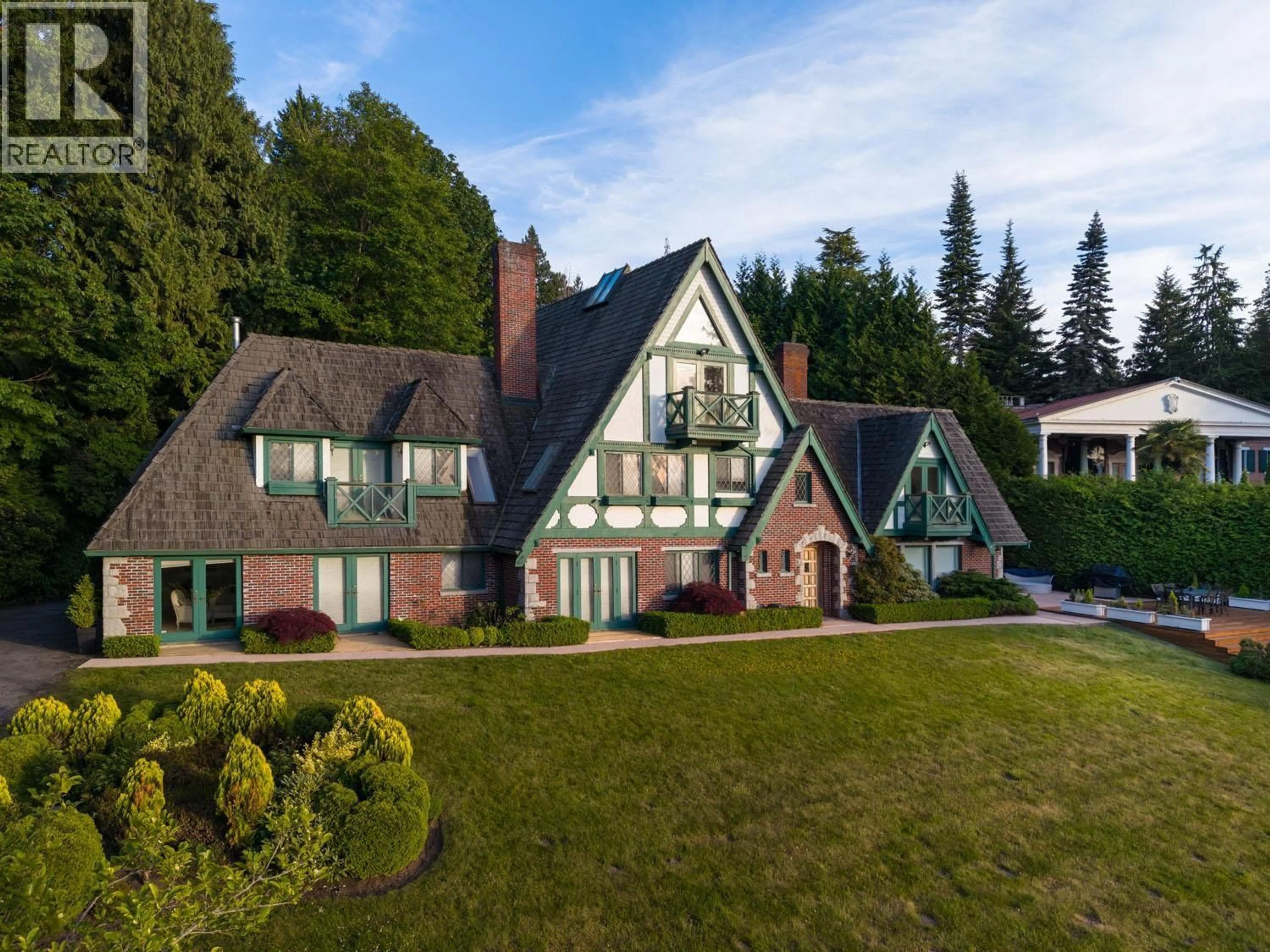 A pic from outside/outdoor area/front of a property/back of a property/a pic from drone, mountain view for 5550 MARINE DRIVE, Vancouver British Columbia V6T1A2